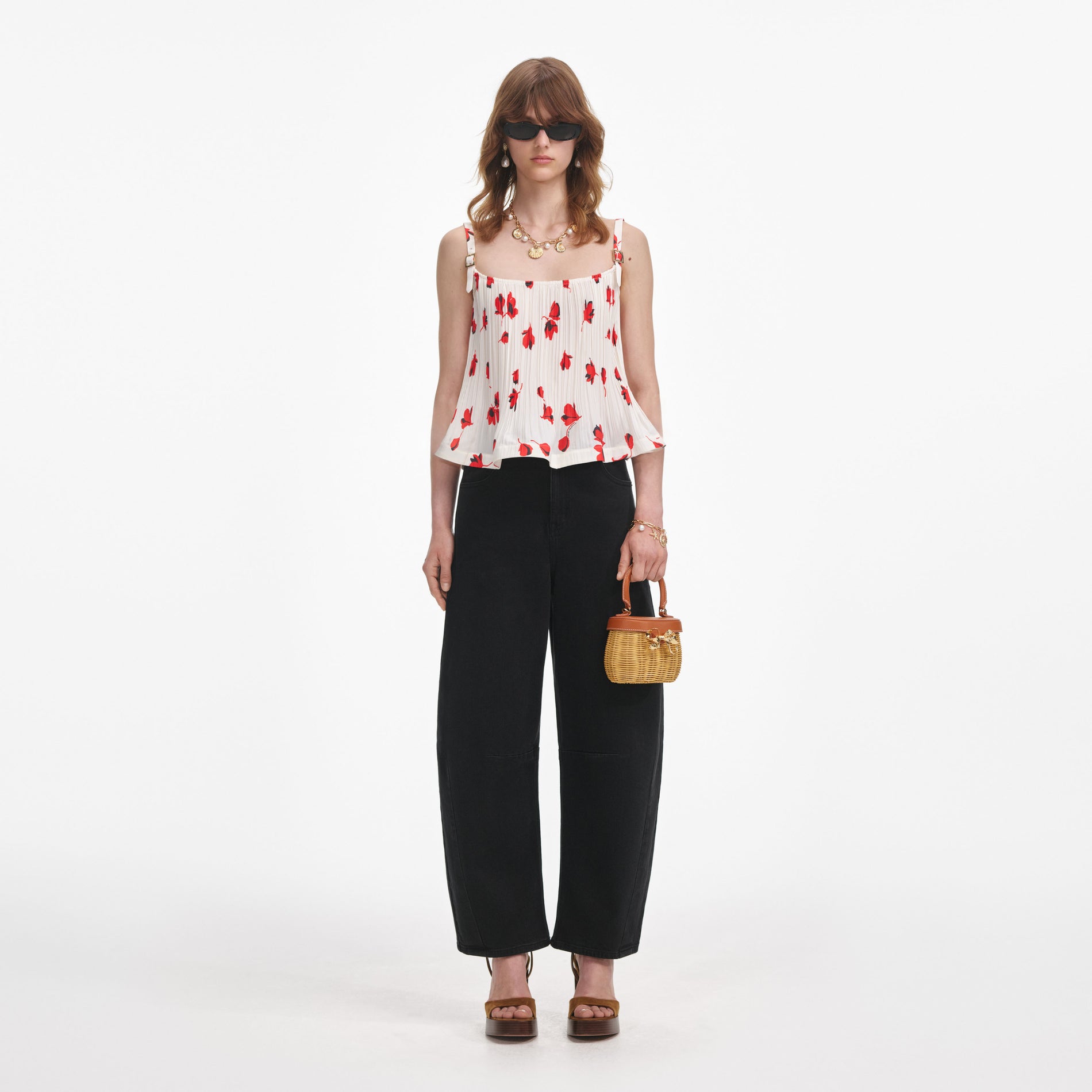 Front view of a woman wearing the White Floral Plisse Top