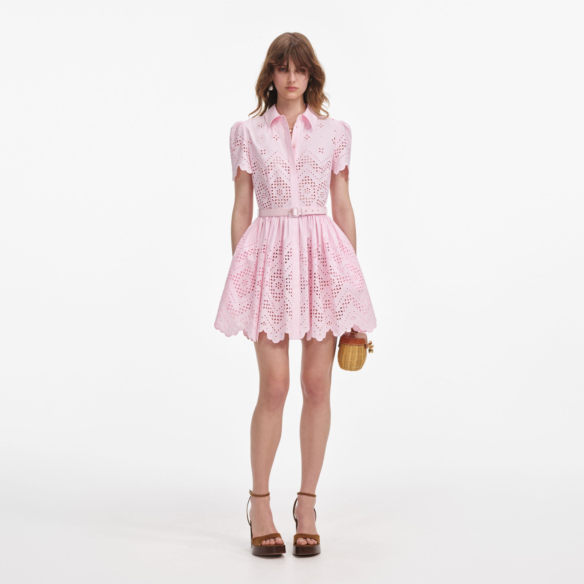 Front view of a woman wearing the Pink Cotton Broderie Mini Dress