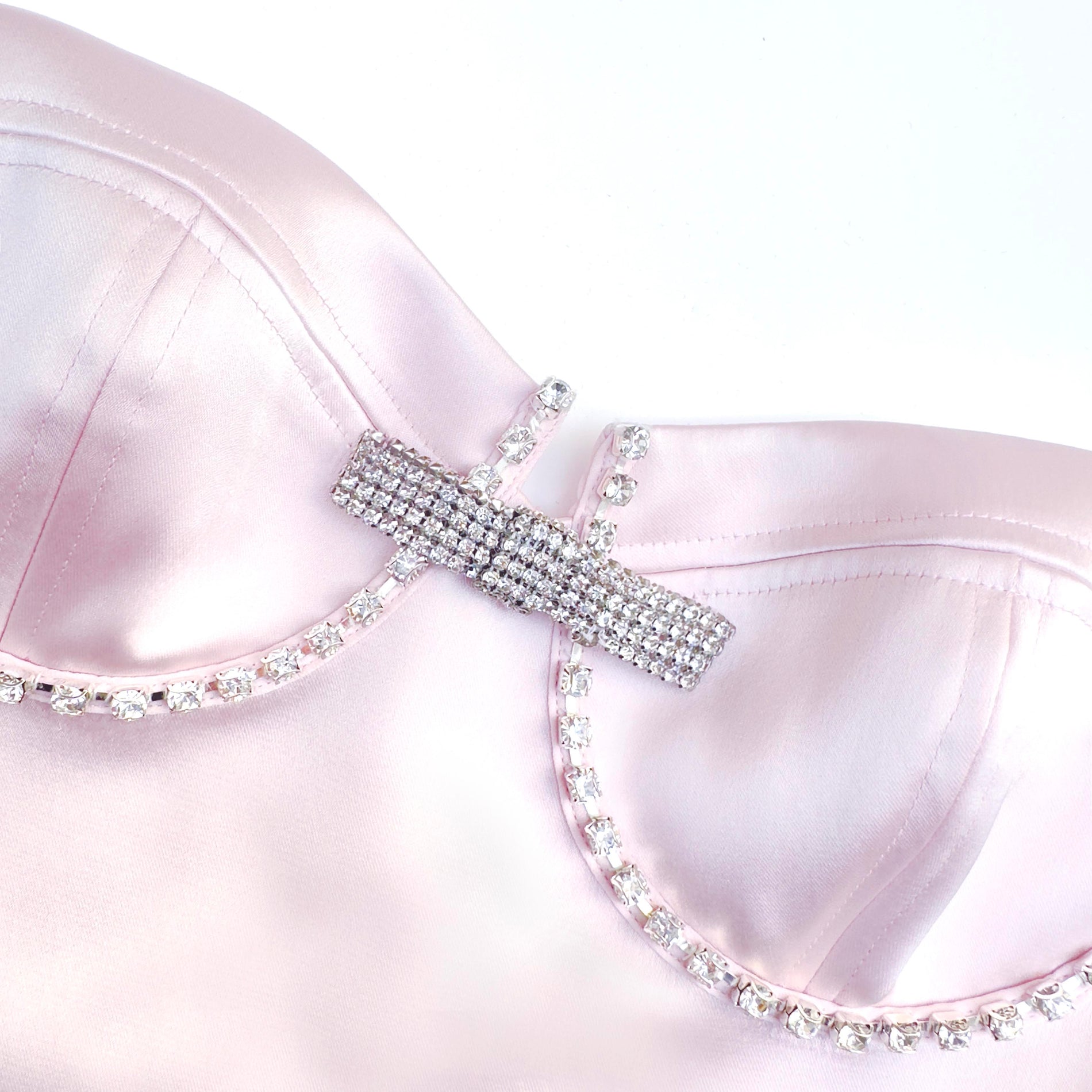 A close up of the fabric for the Pink Satin Diamante Mini Dress