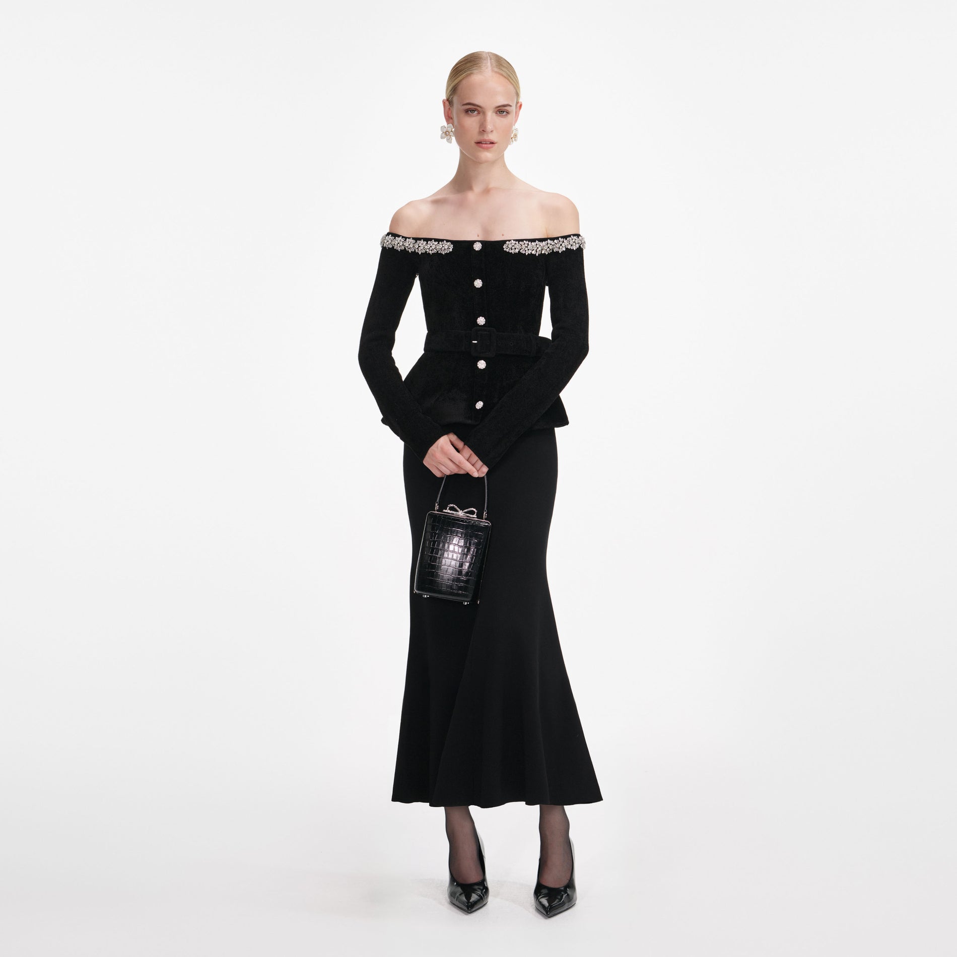 Front view of a woman wearing the Black Chenille Knit Crystal Trim Midi Dress