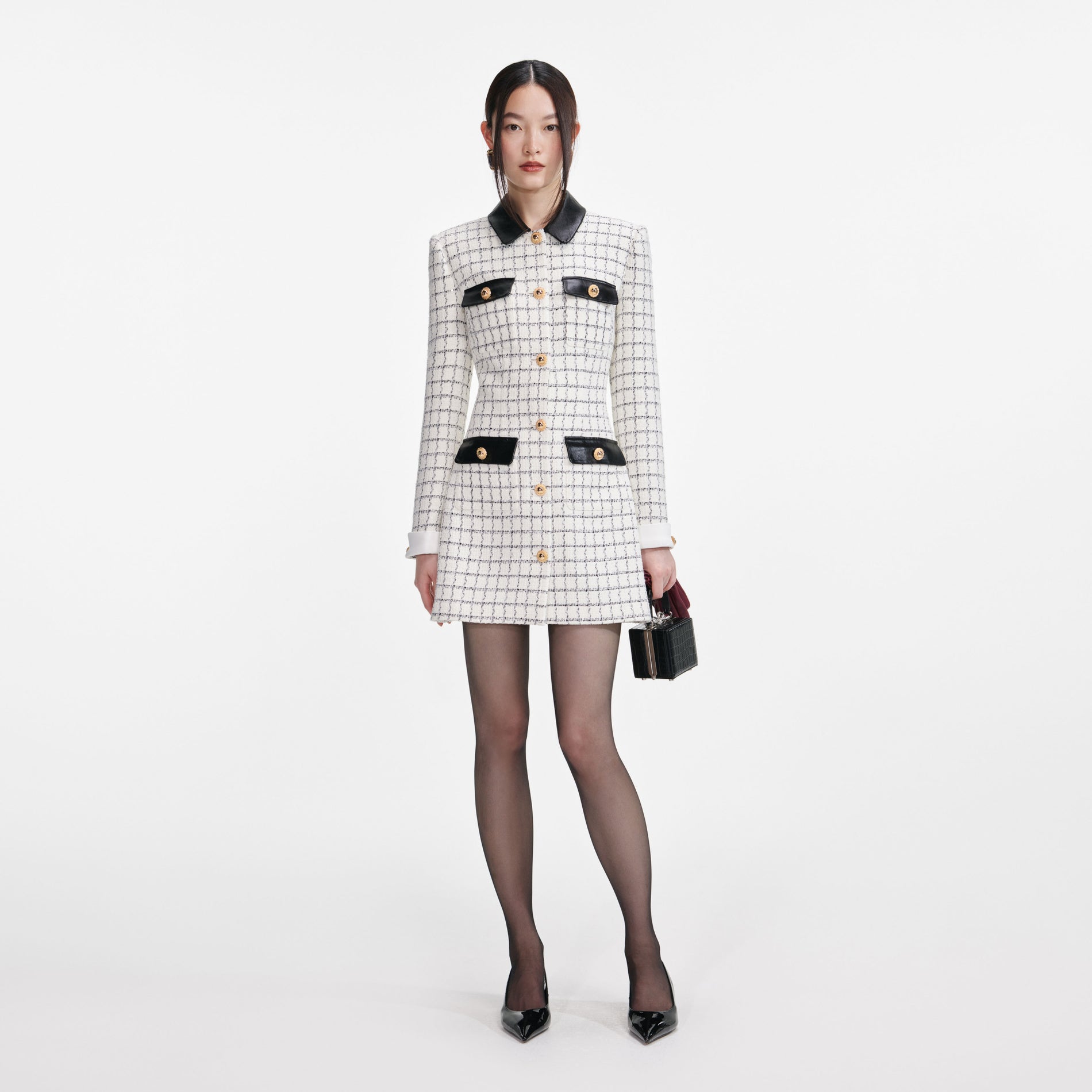 Front view of a woman wearing the Check Boucle Long Sleeve Mini Dress