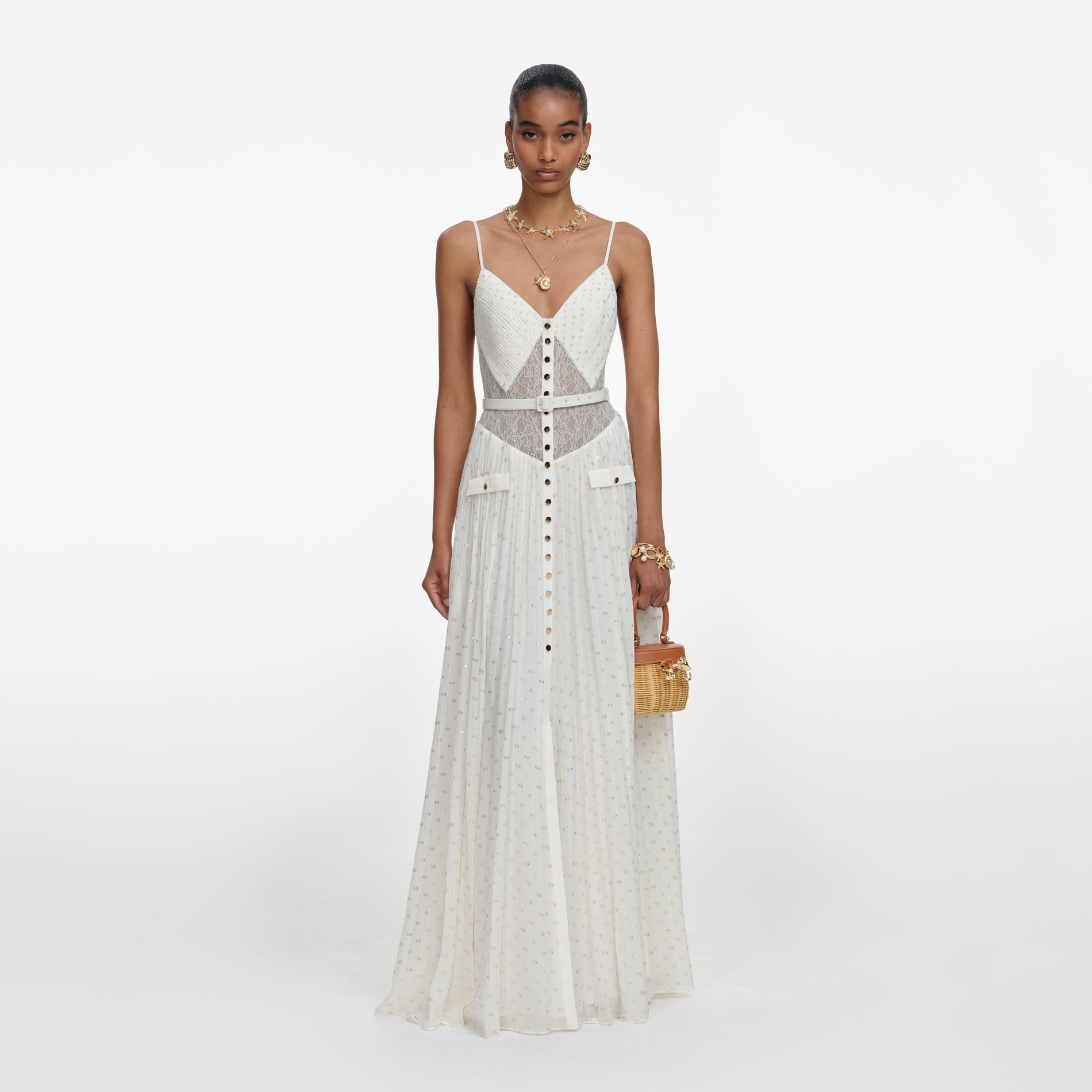 Front view of a woman wearing the Cream And Gold Chiffon Maxi Dress