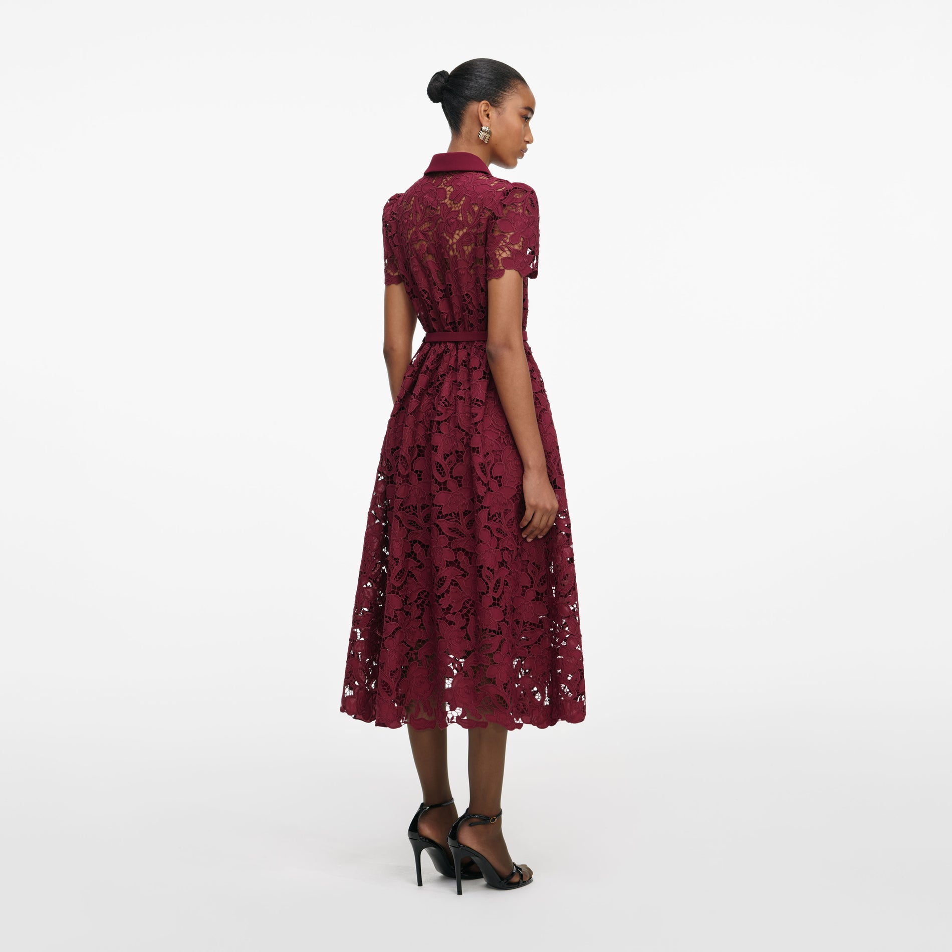 Back view of a woman wearing the Burgundy Lace Collared Midi Dress