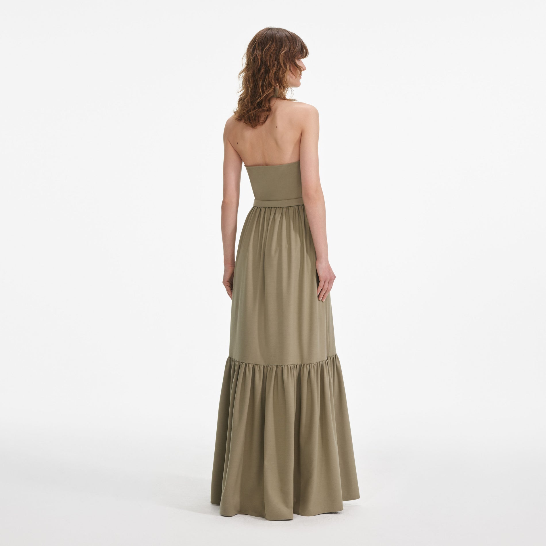 Back view of a woman wearing the Beige Sleeveless Twill Maxi Dress
