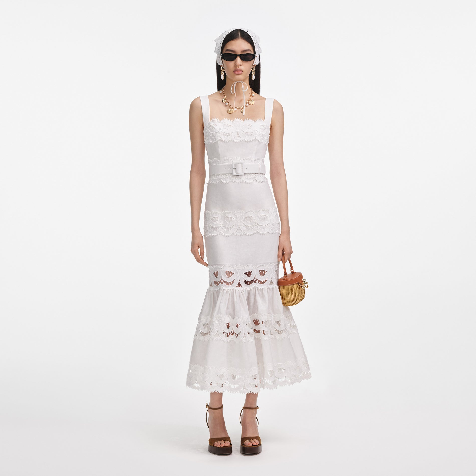 Front view of a woman wearing the White Linen Lace Insert Midi Dress