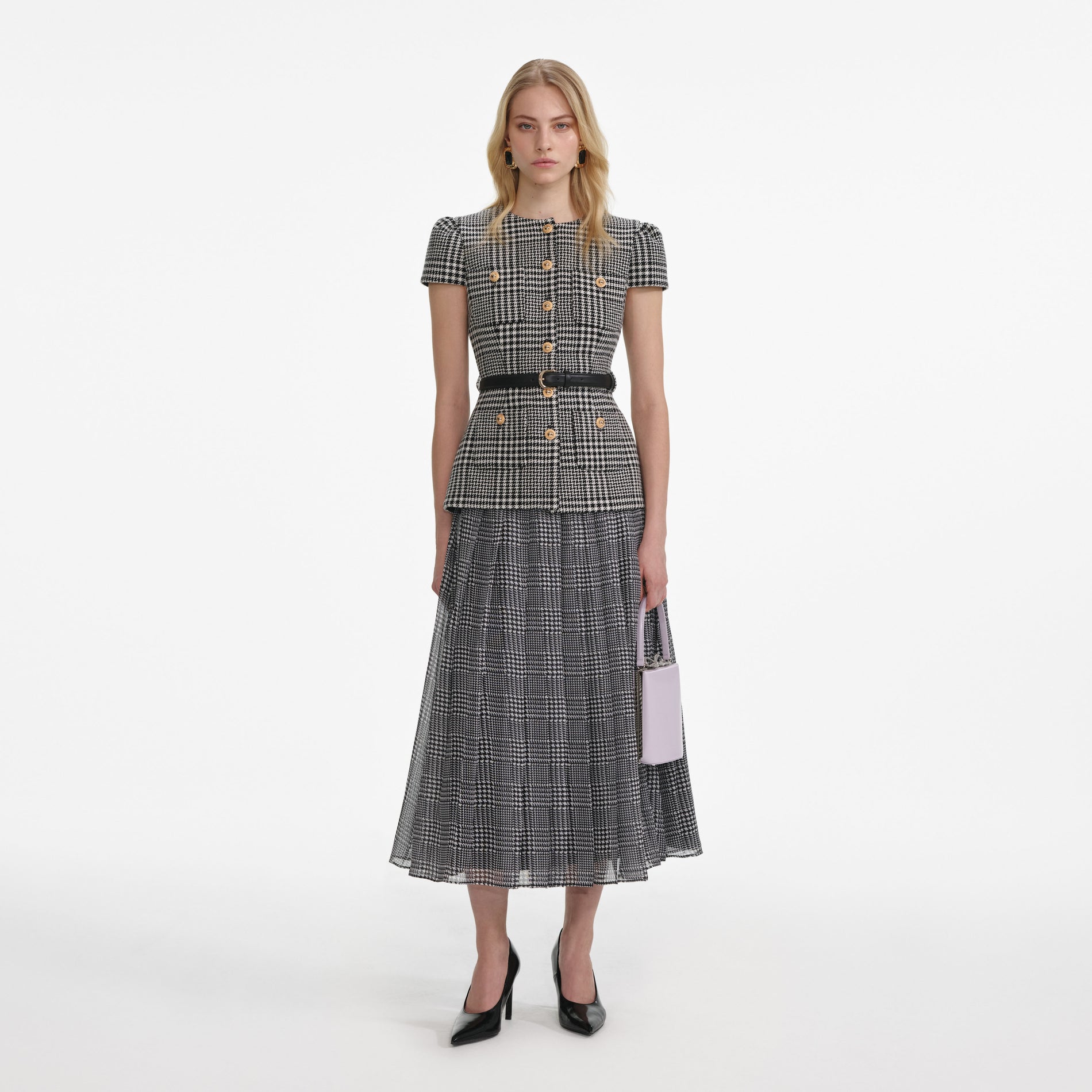 Front view of a woman wearing the Houndstooth Tailored Midi Dress