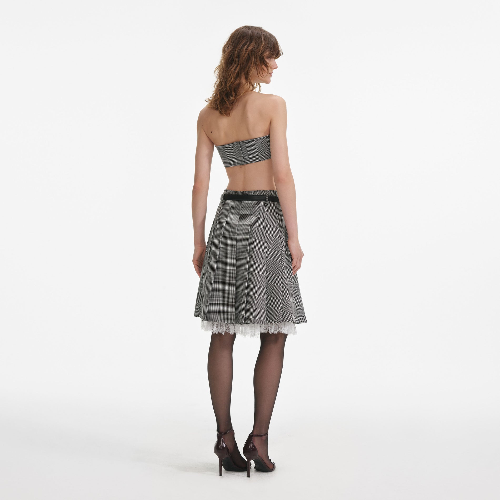 Back view of a woman wearing the Prince Of Wales Check Bandeau Top