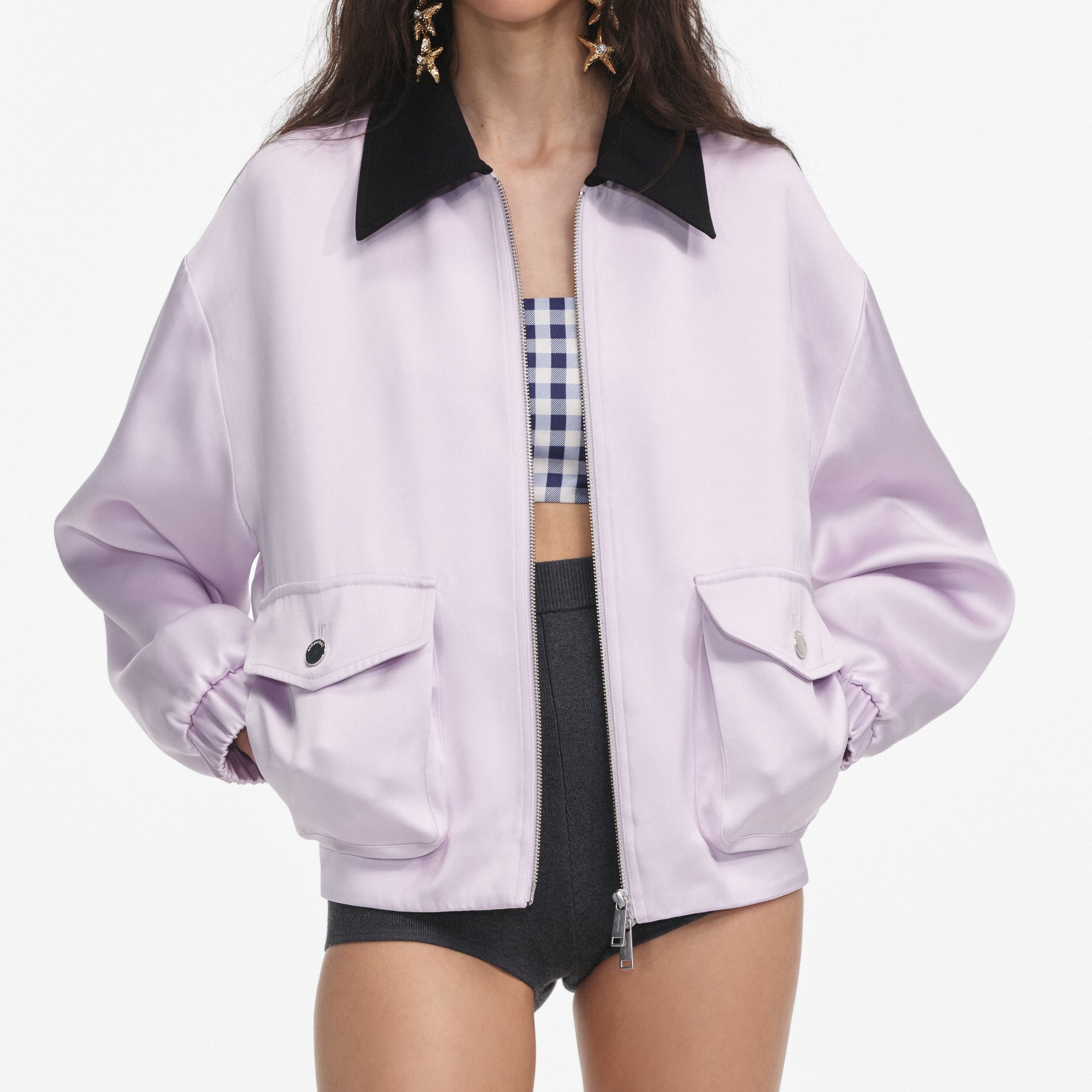 A close up of a woman wearing the Lilac Viscose Jacket