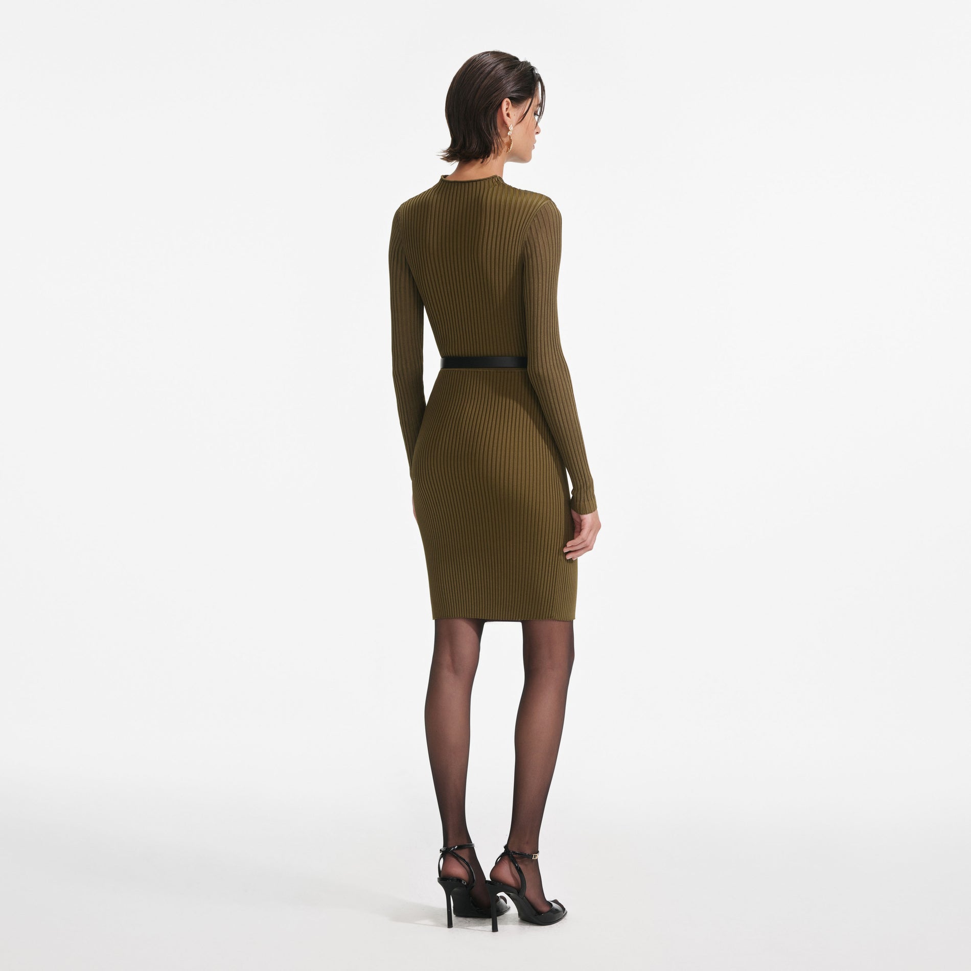 Back view of a woman wearing the Khaki Cut Out Rib Knit Mini Dress