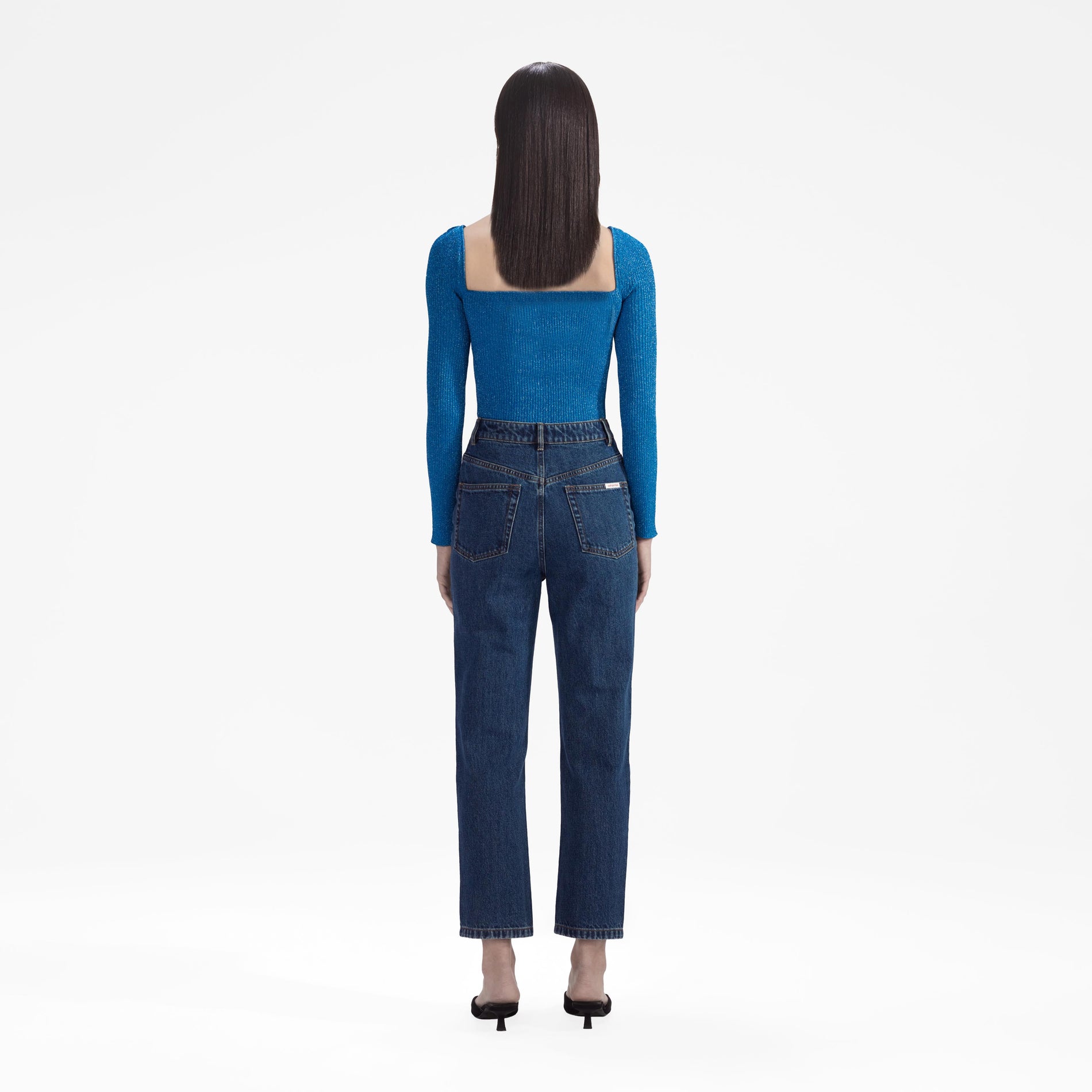 Back view of a woman wearing the Blue Lurex Knit Top