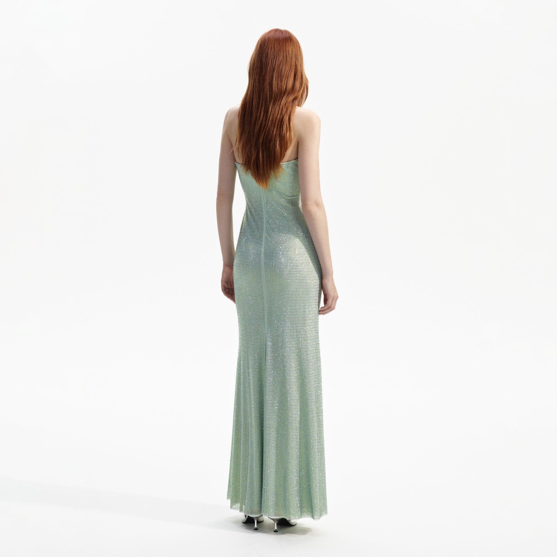 Back view of a woman wearing the Mint Rhinestone Strapless Maxi Dress