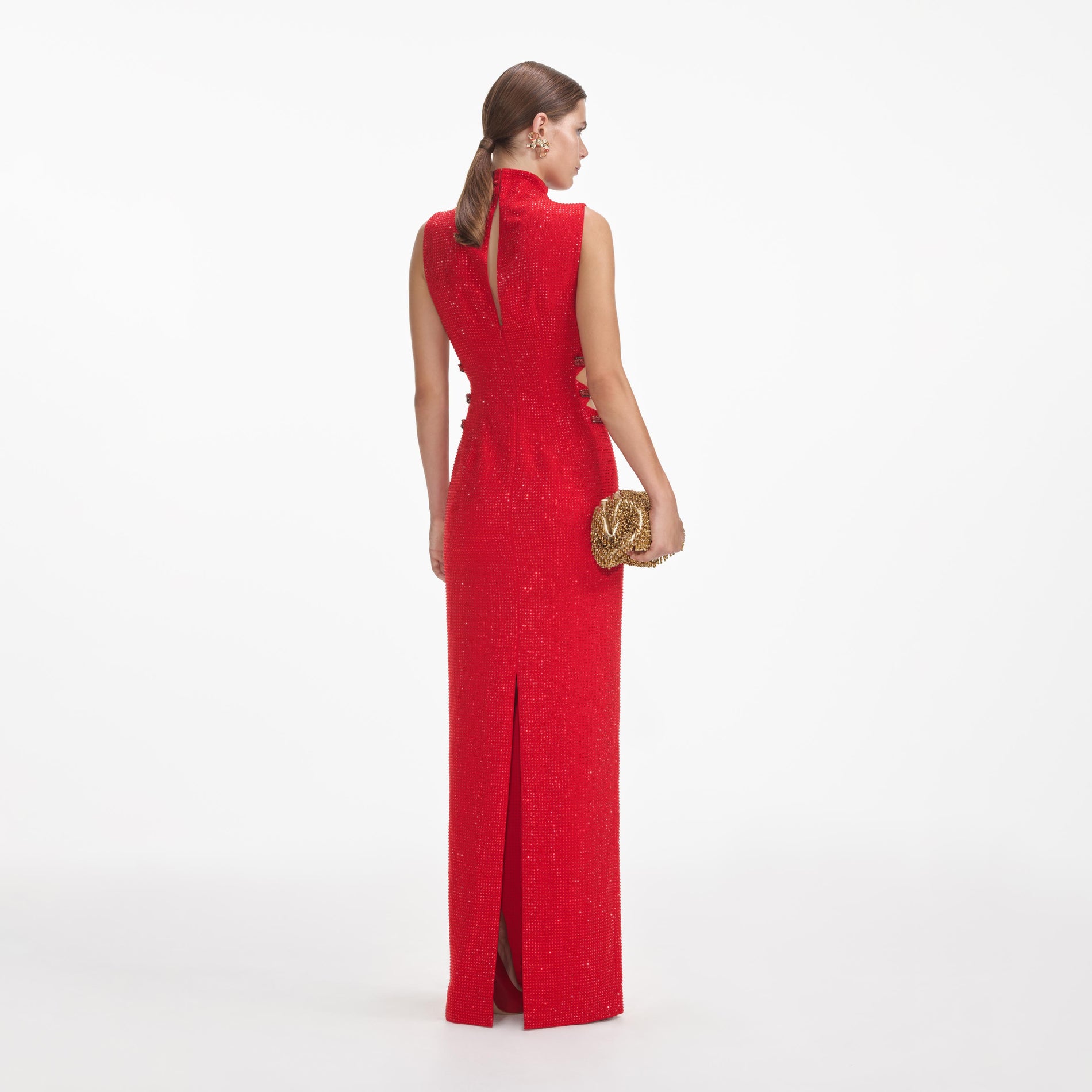 Back view of a woman wearing the Red Rhinestone Crepe Maxi Dress