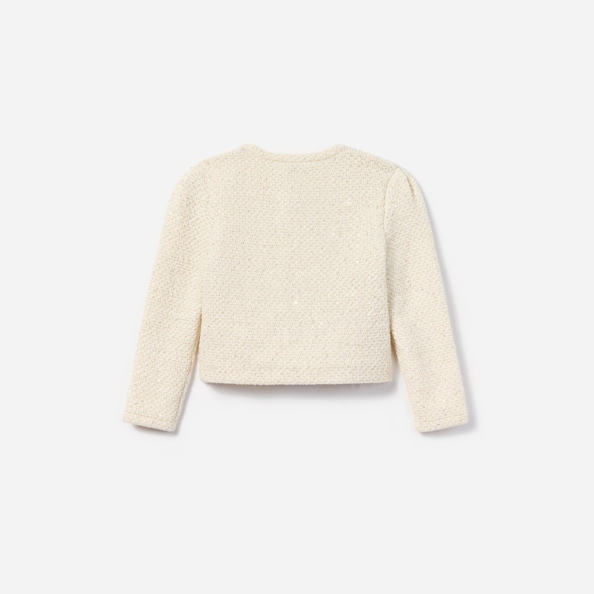 Side view of a woman wearing the Cream Sequin Cardigan