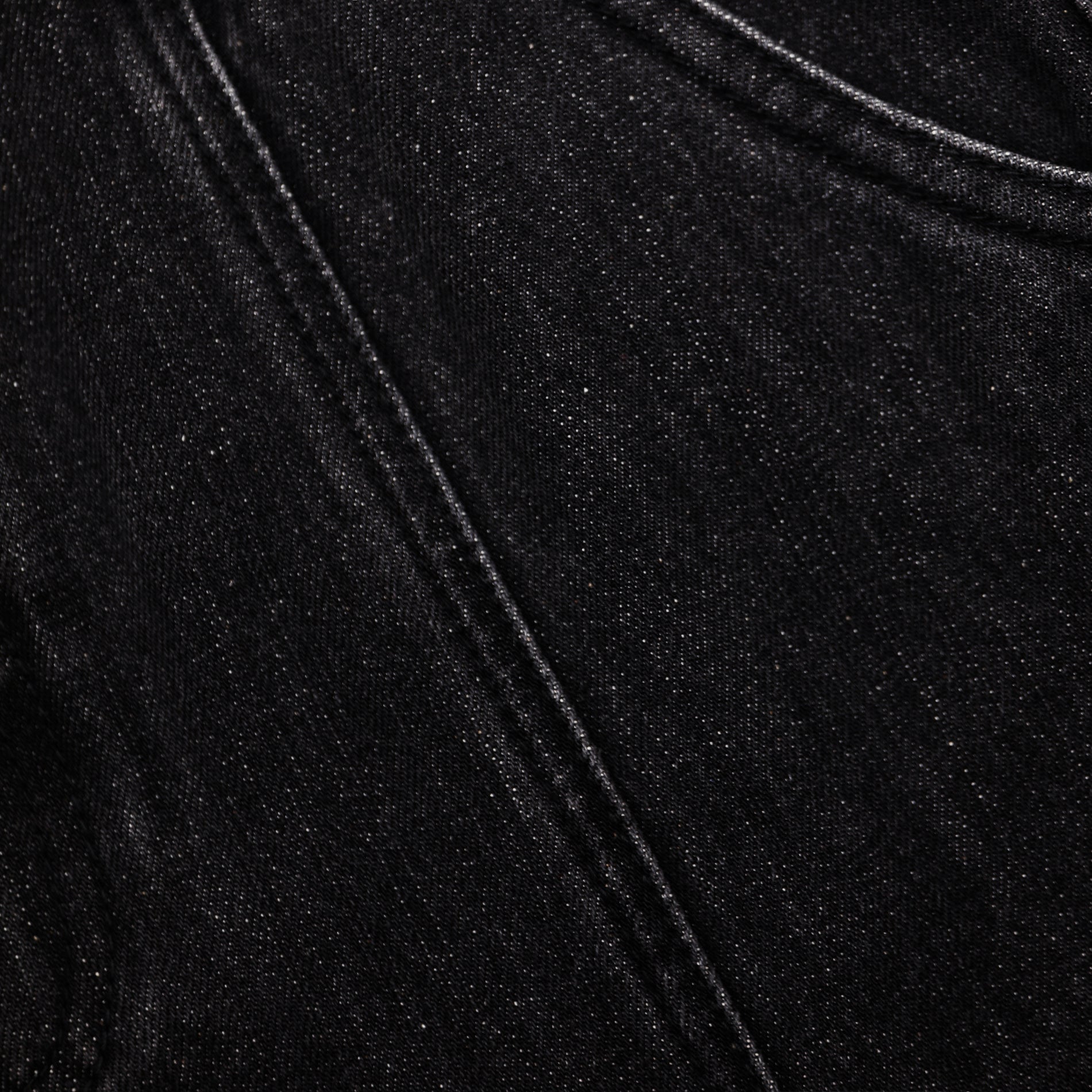 A close up of the fabric for the Black Flared Denim Midi Skirt