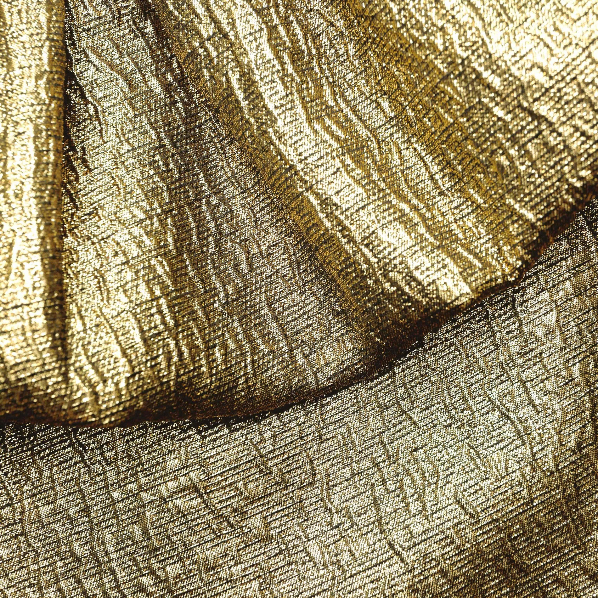 A close up of the fabric for the Gold Metallic Jacquard Midi Skirt