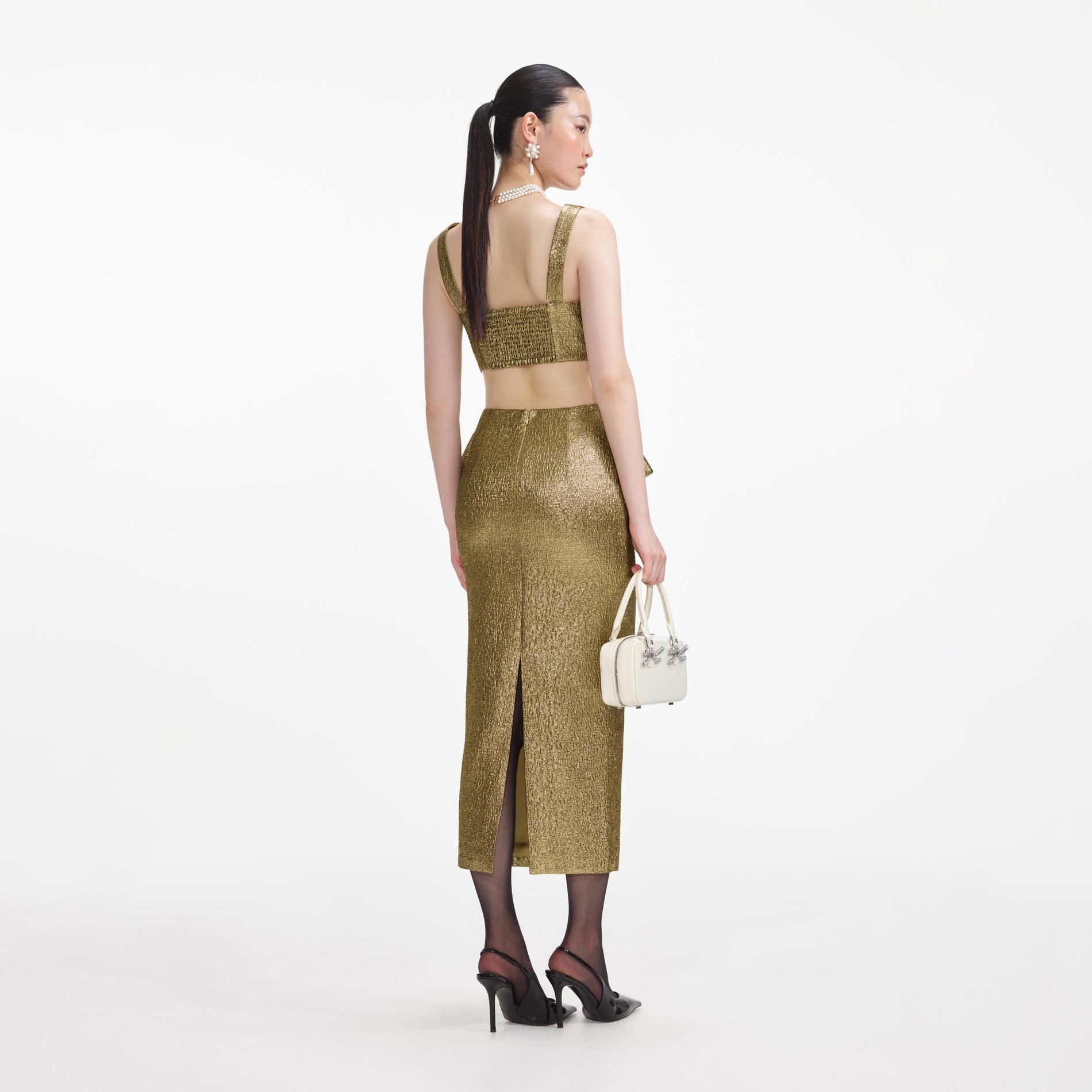 Back view of a woman wearing the Gold Metallic Jacquard Crop Top