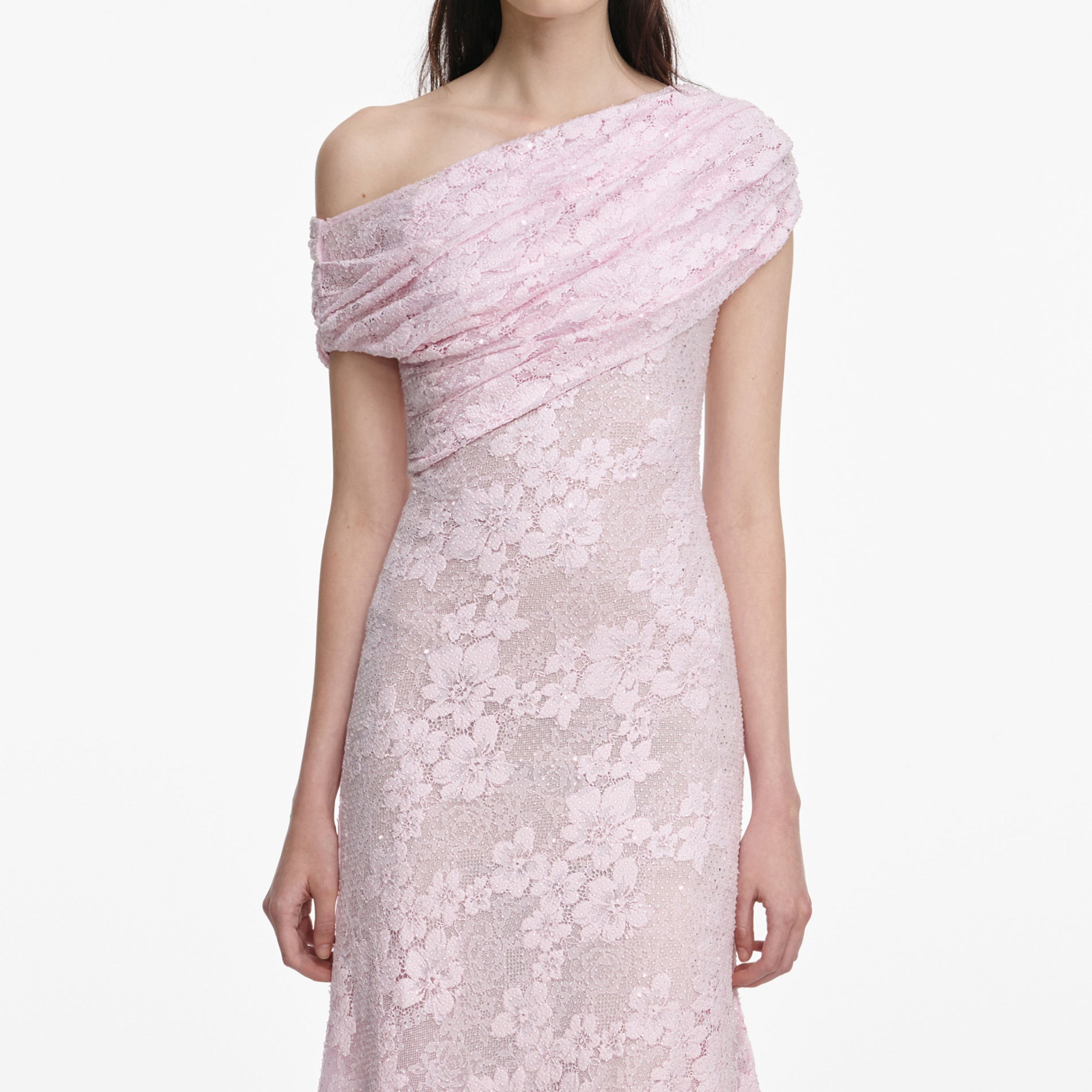 A close up of a woman wearing the Pink Rhinestone Lace Midi Dress