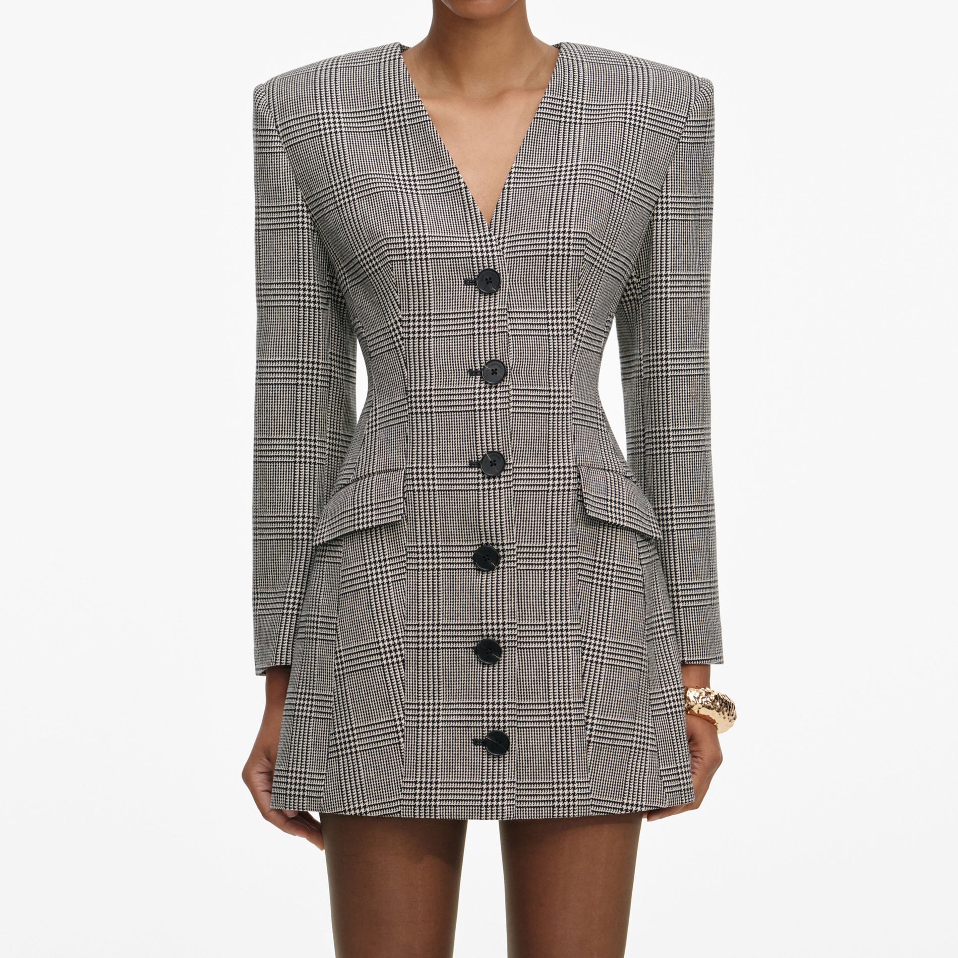A close up of a woman wearing the Check Blazer Mini Dress