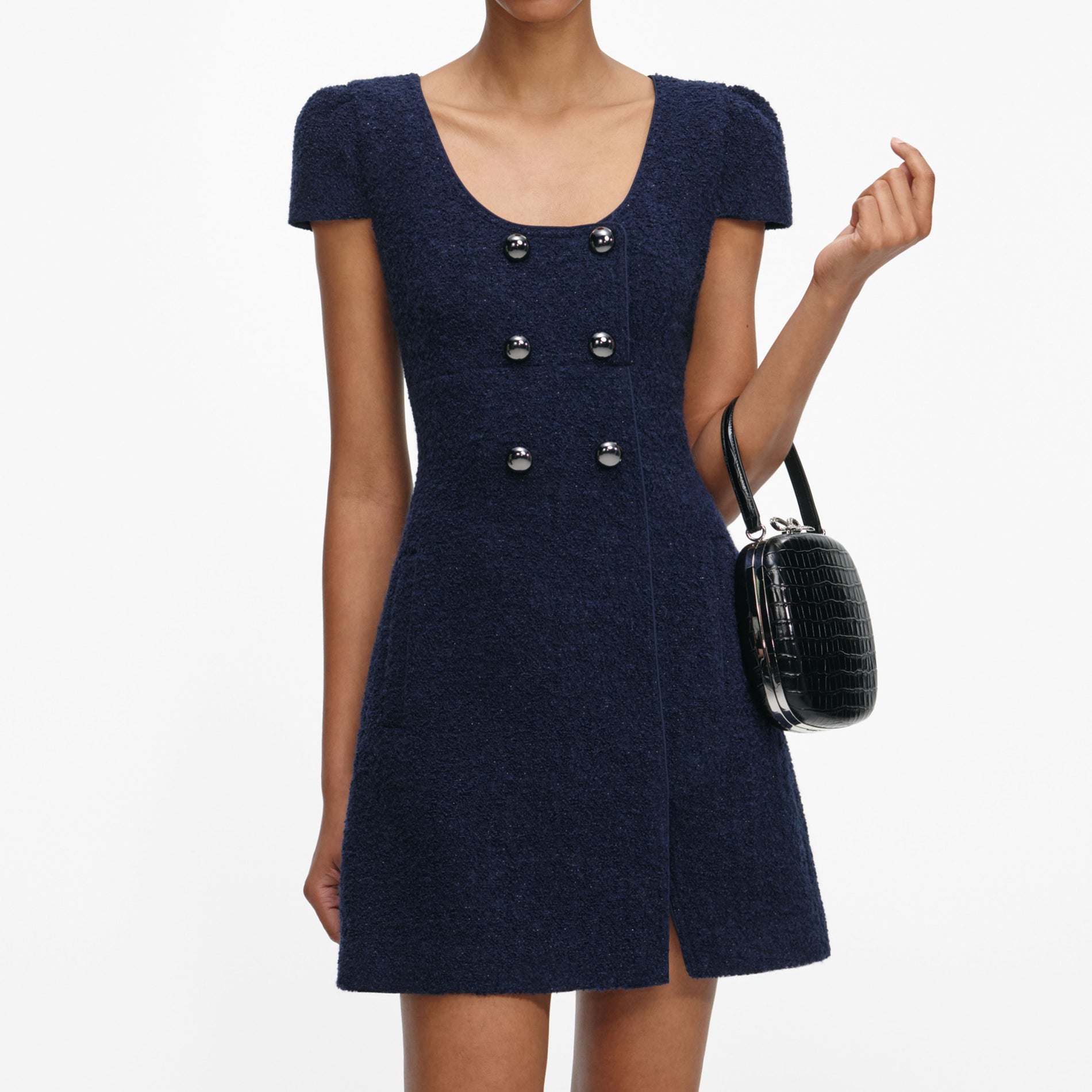 A close up of a woman wearing the Navy Textured Boucle Mini Dress