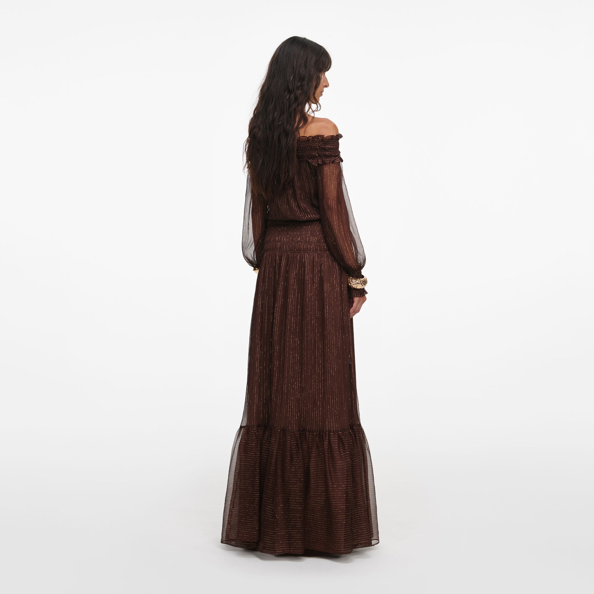 Back view of a woman wearing the Brown Georgette Maxi Dress
