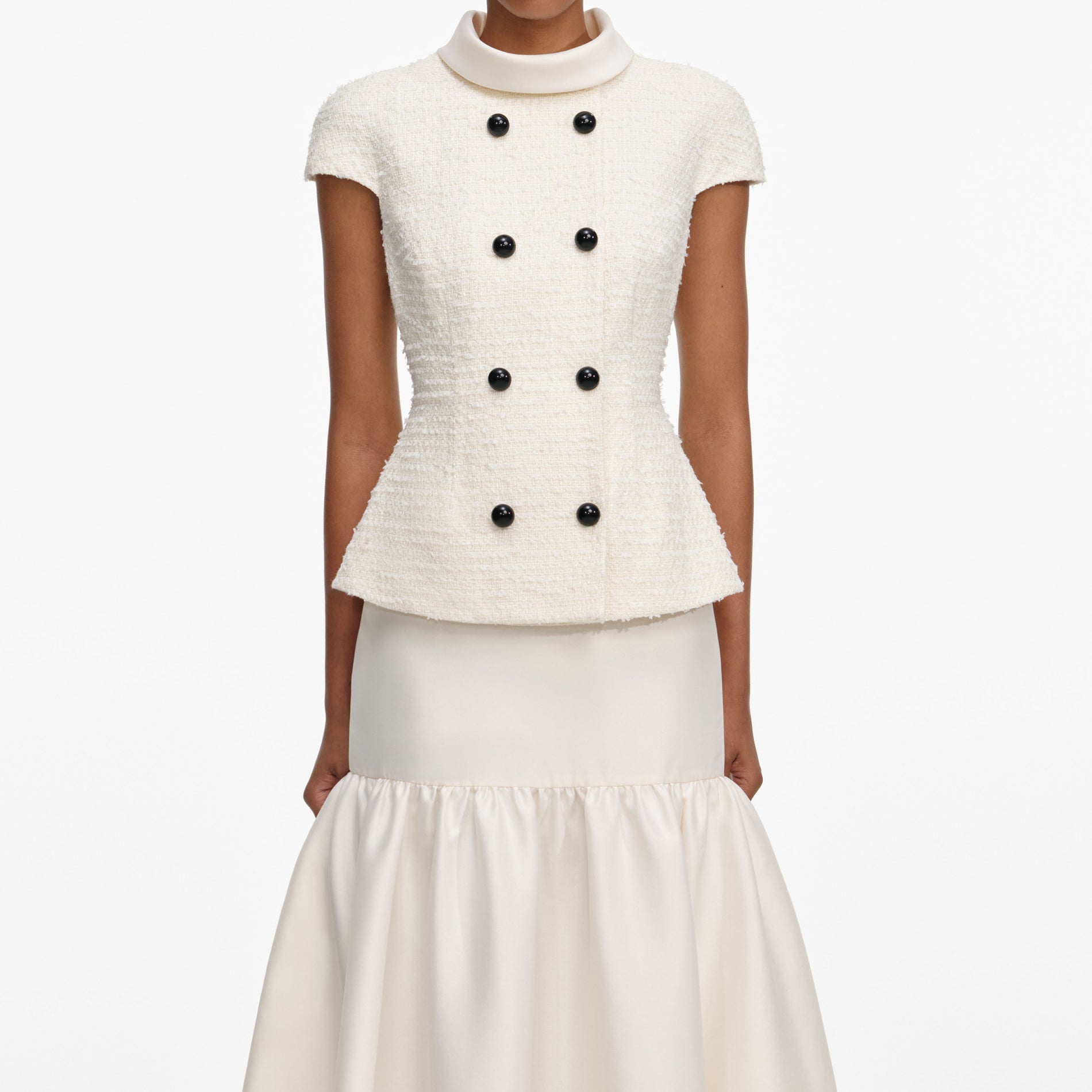 A close up of a woman wearing the Cream Boucle Taffeta Maxi Dress