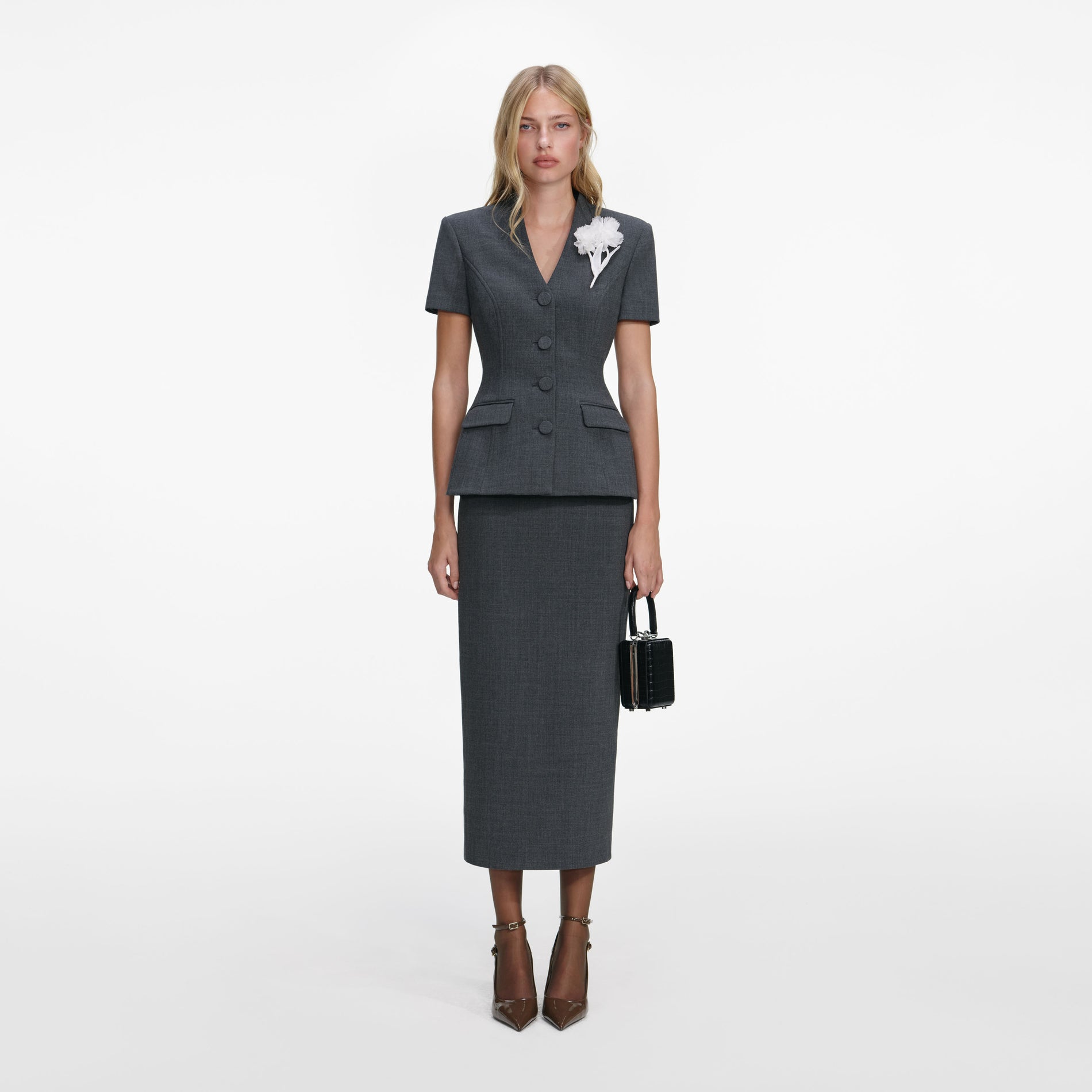 Front view of a woman wearing the Grey Tailored Flower Detail Midi Dress