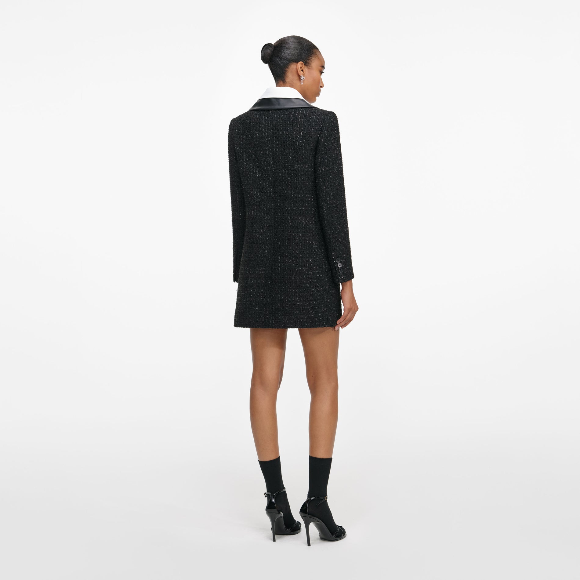 Back view of a woman wearing the Black Boucle Contrast Collar Mini Dress