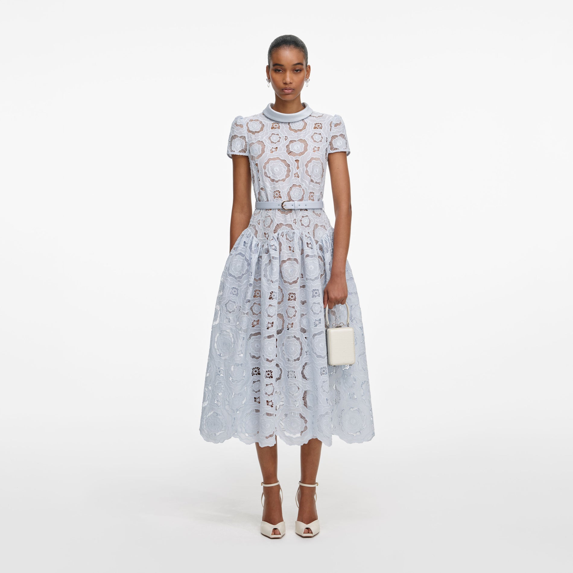 Front view of a woman wearing the Blue Floral Lace Midi Dress