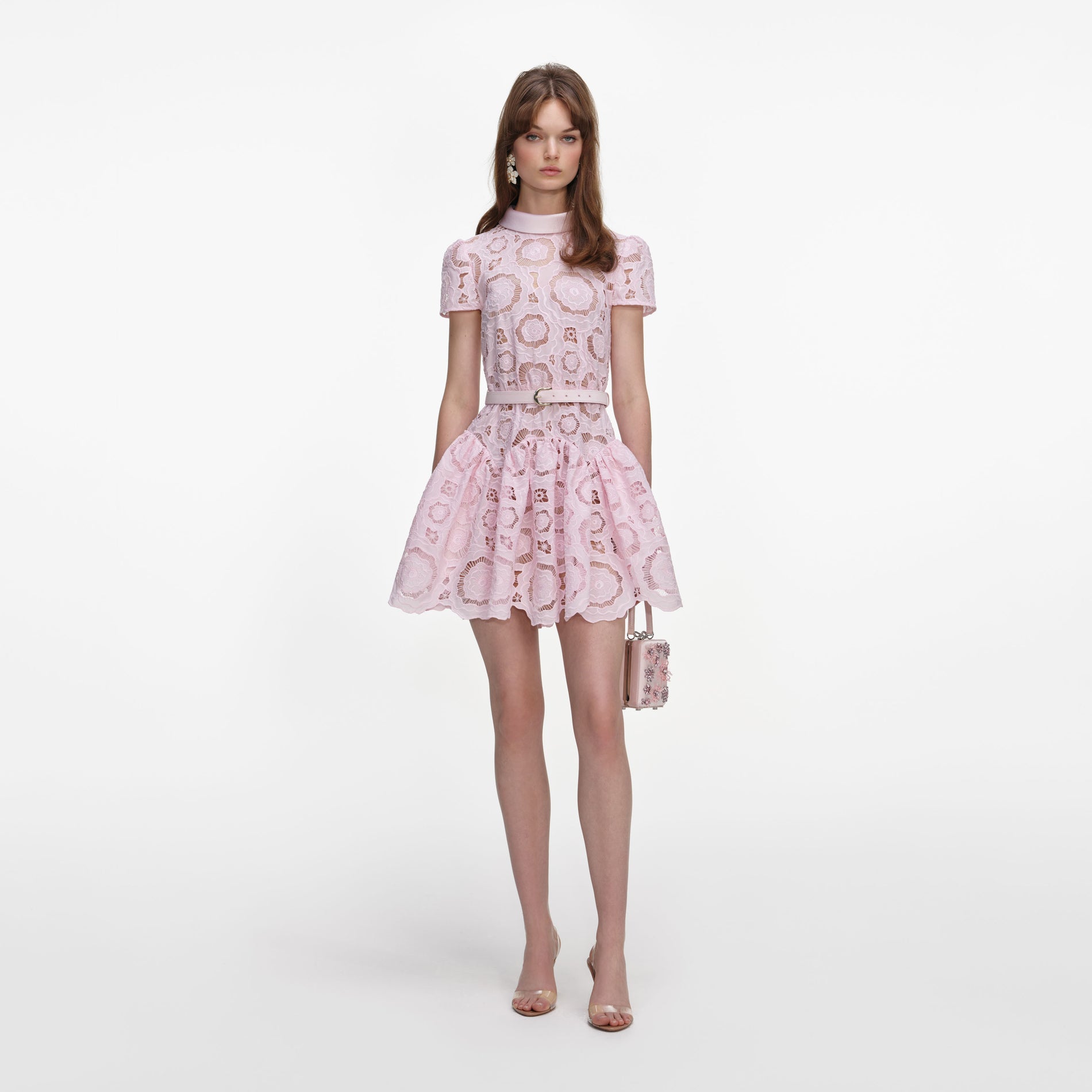 Front view of a woman wearing the Pink Floral Lace Mini Dress