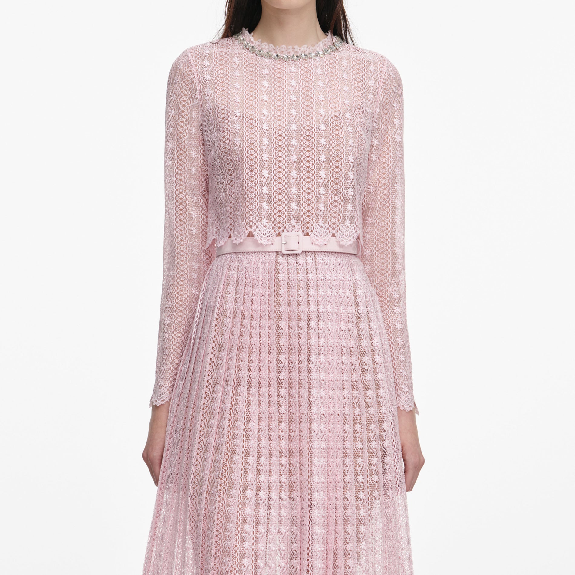 A close up of a woman wearing the Pink Organza Lace Midi Dress