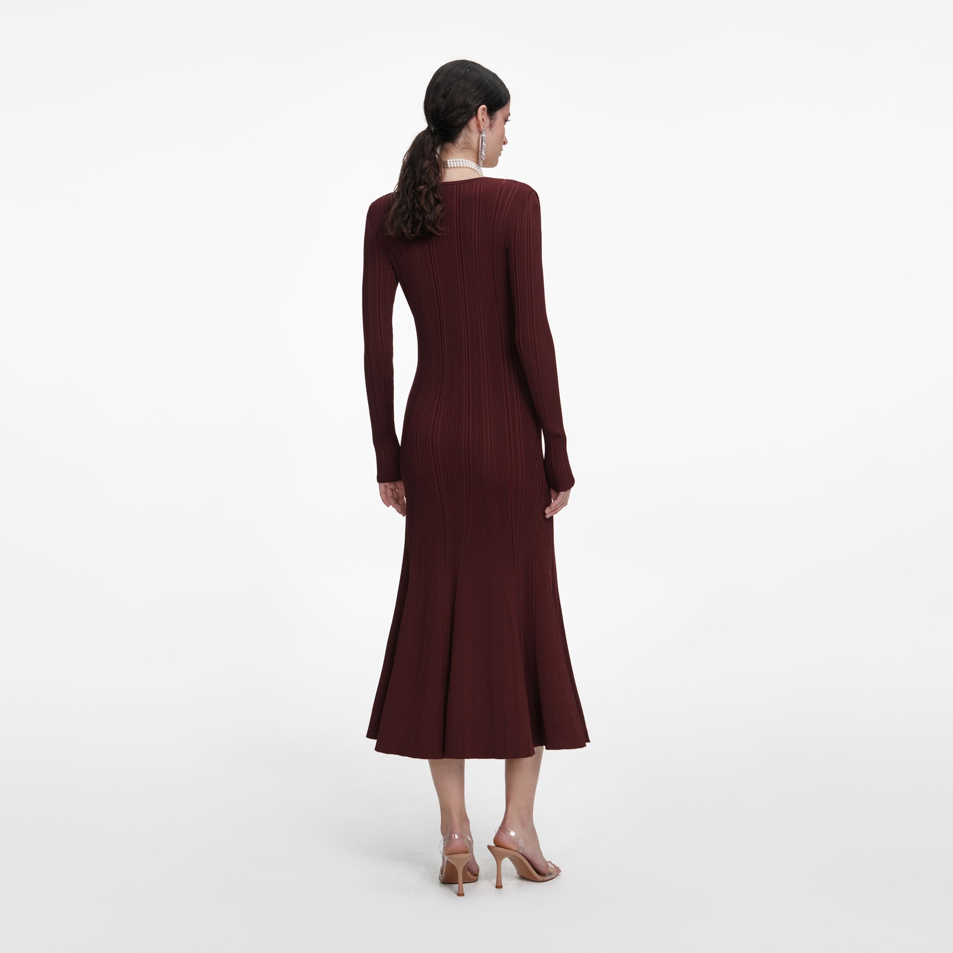Back view of a woman wearing the Brown Contrast Lace Knit Midi Dress