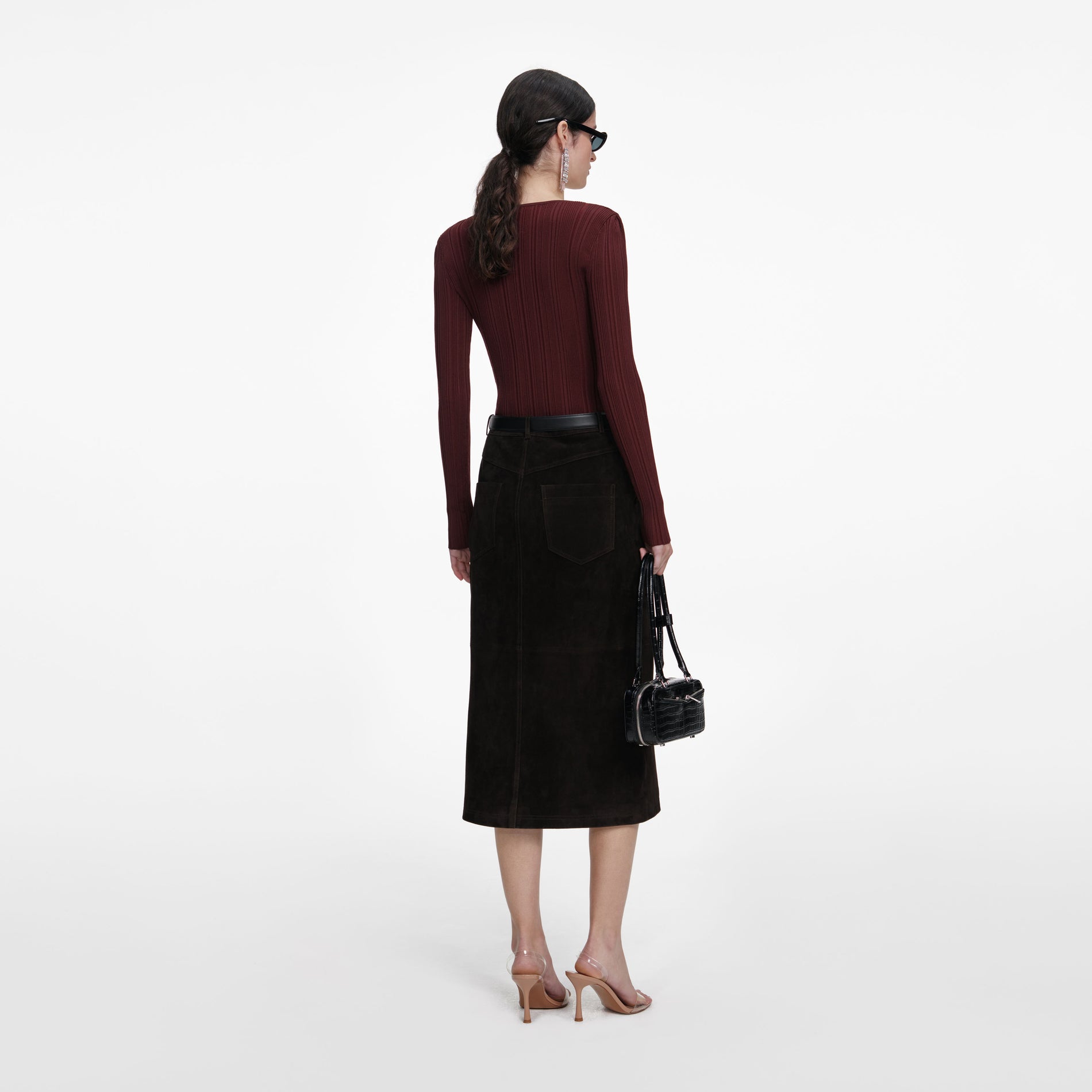 Back view of a woman wearing the Brown Contrast Lace Knit Top
