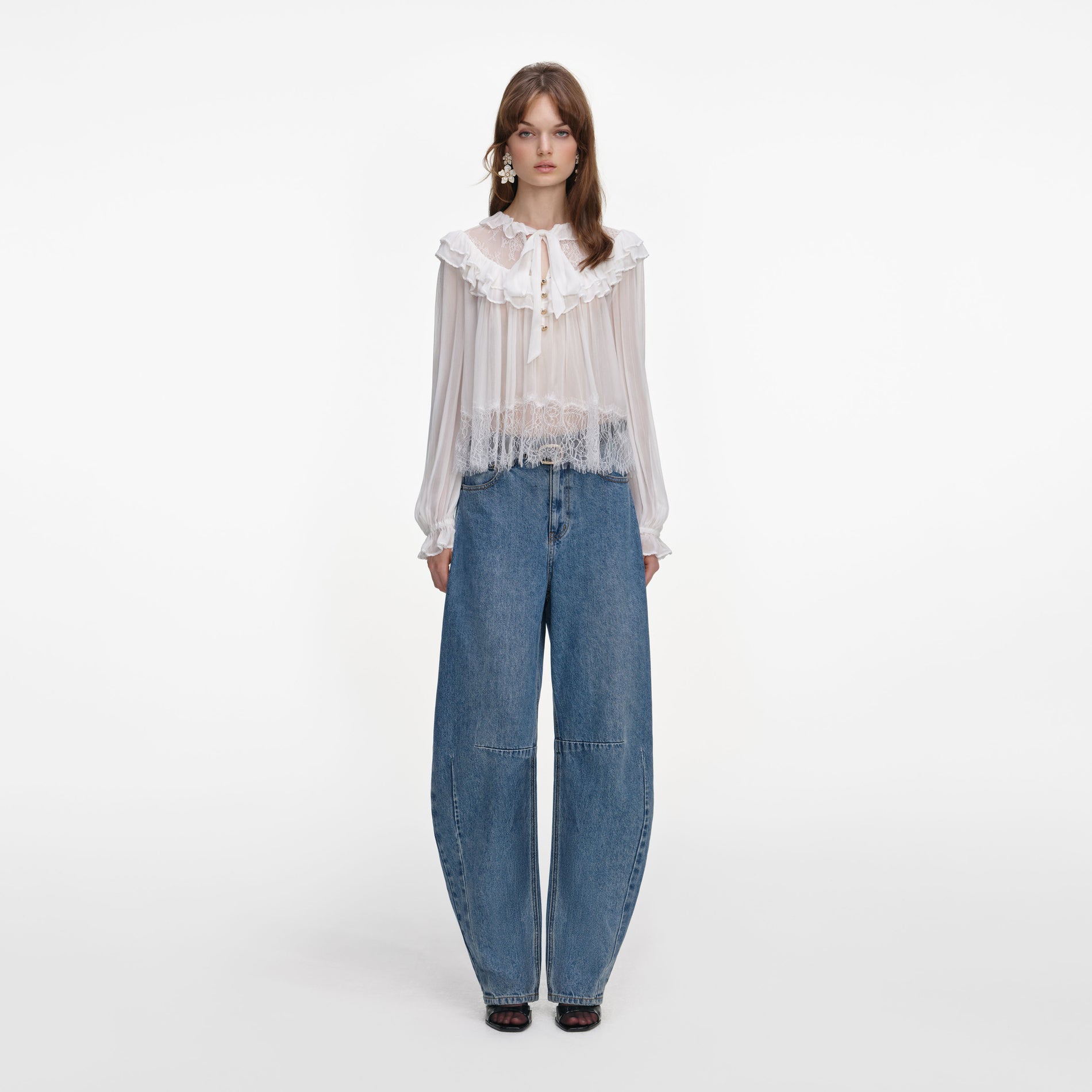 Front view of a woman wearing the White Georgette Lace Blouse