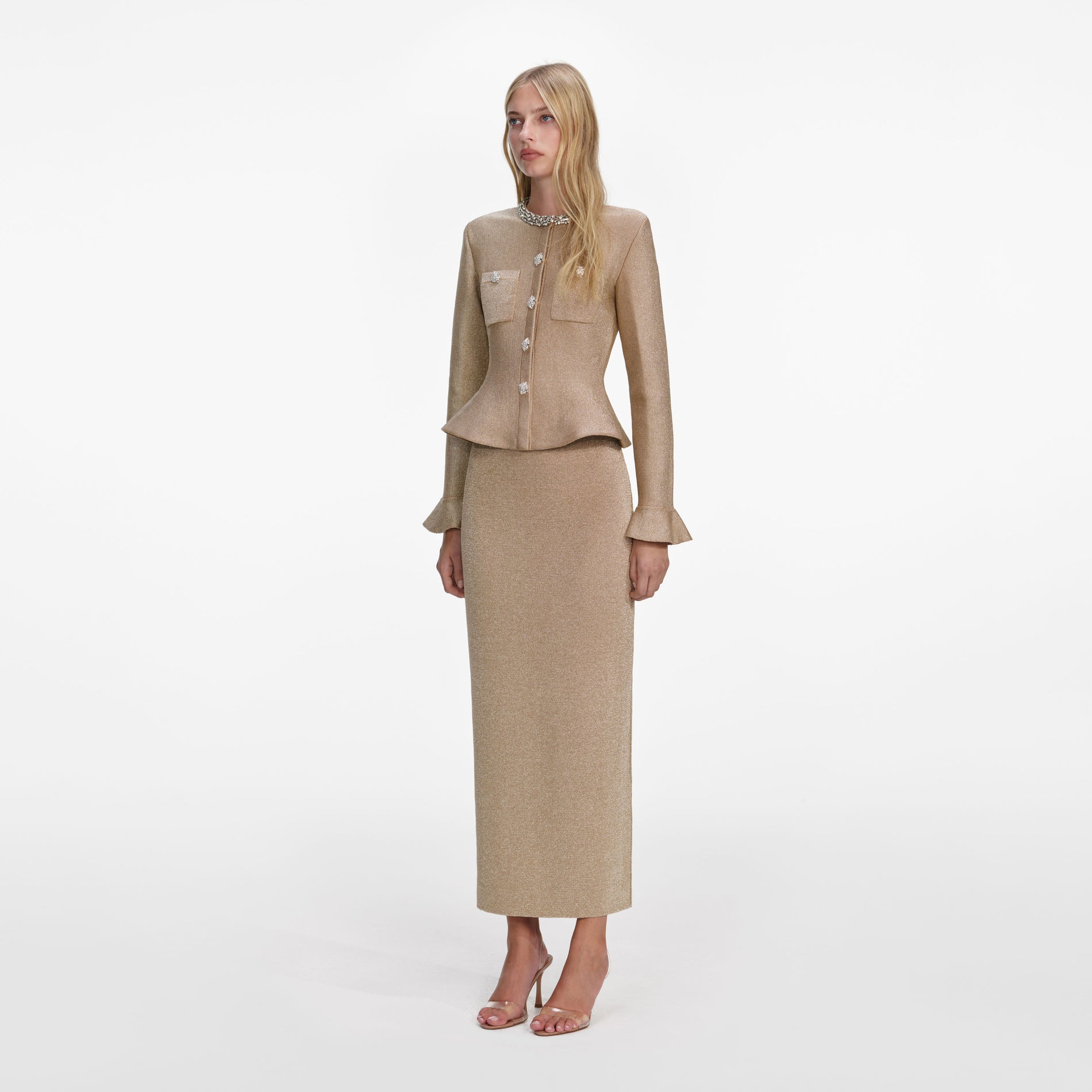 Side view of a woman wearing the Gold Crystal Trim Knit Midi Dress