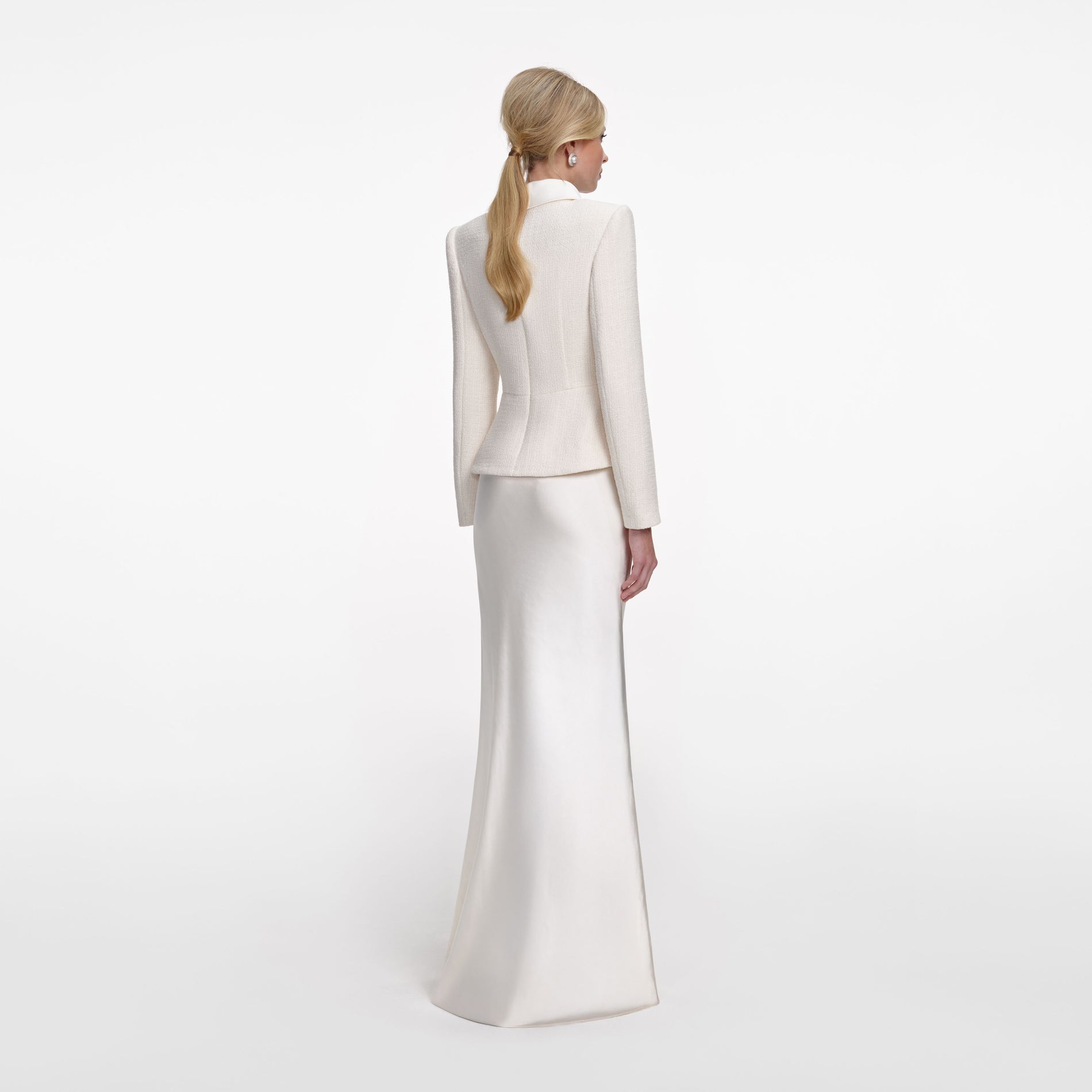 Back view of a woman wearing the Cream Boucle Collared Maxi Dress