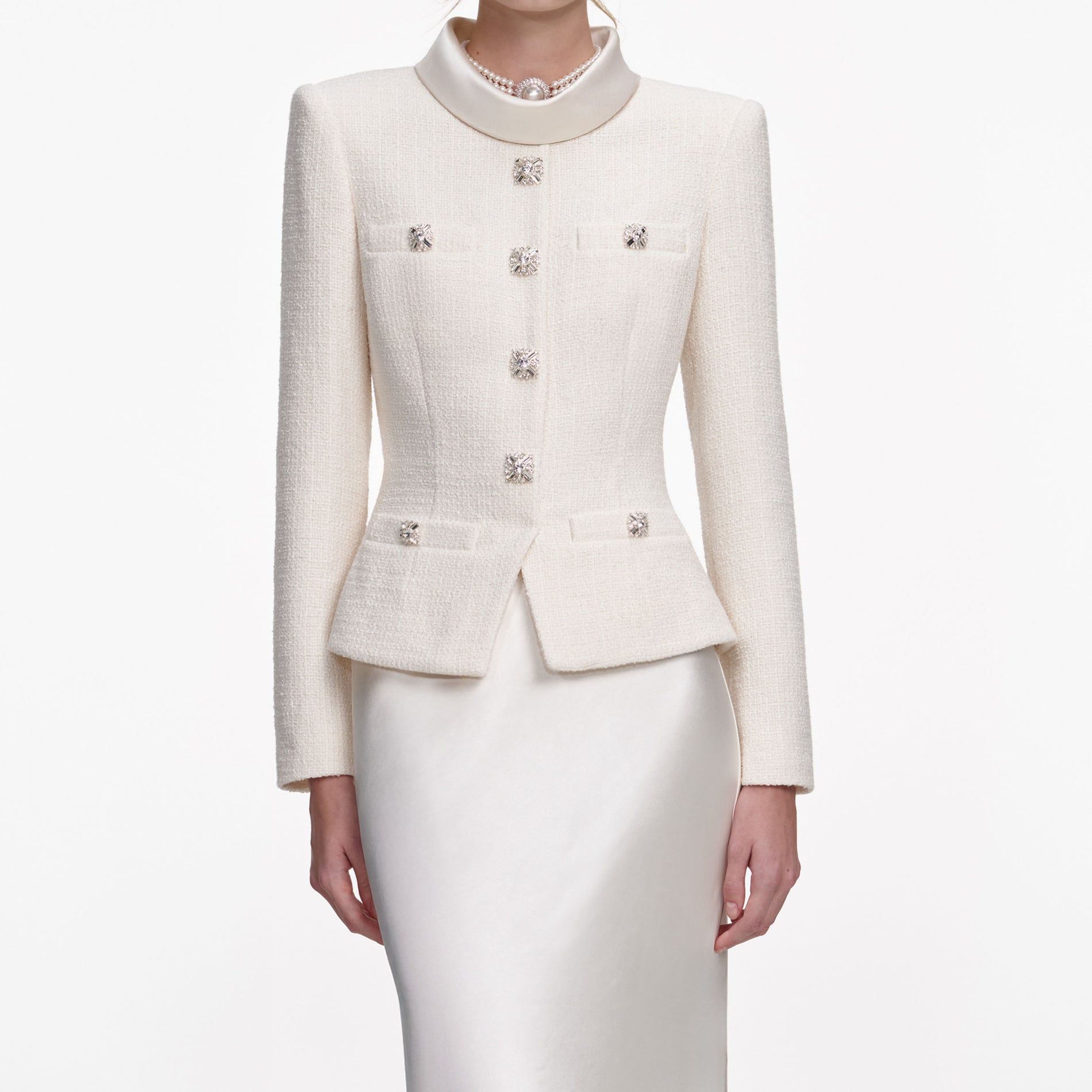 A close up of a woman wearing the Cream Boucle Collared Maxi Dress