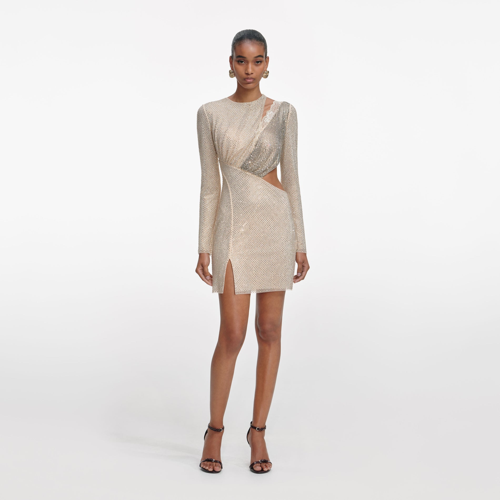 Front view of a woman wearing the Champagne Rhinestone Lace Trim Mini Dress