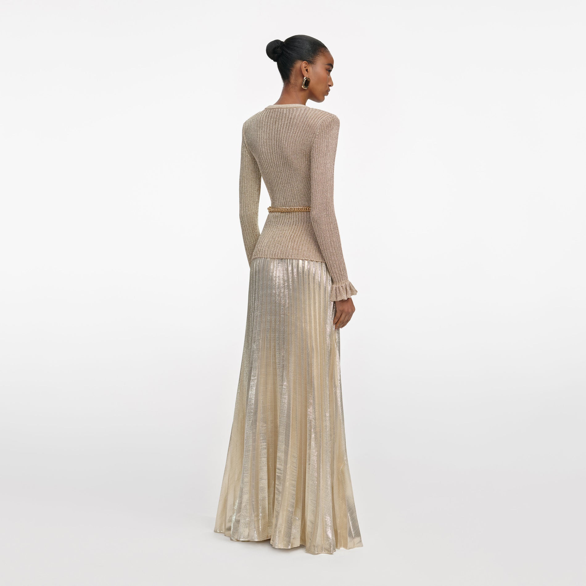 Back view of a woman wearing the Gold Lurex Ribbed Knit Maxi Dress