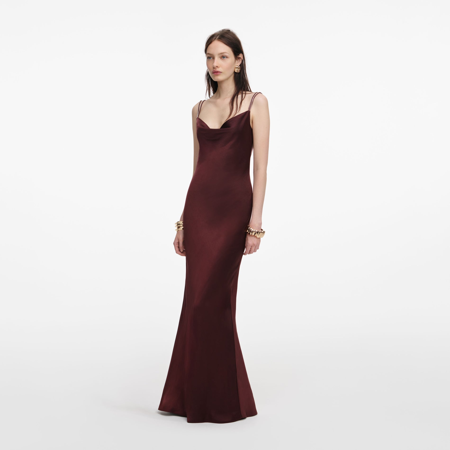 Side view of a woman wearing the Brown Satin Diamante Maxi Dress