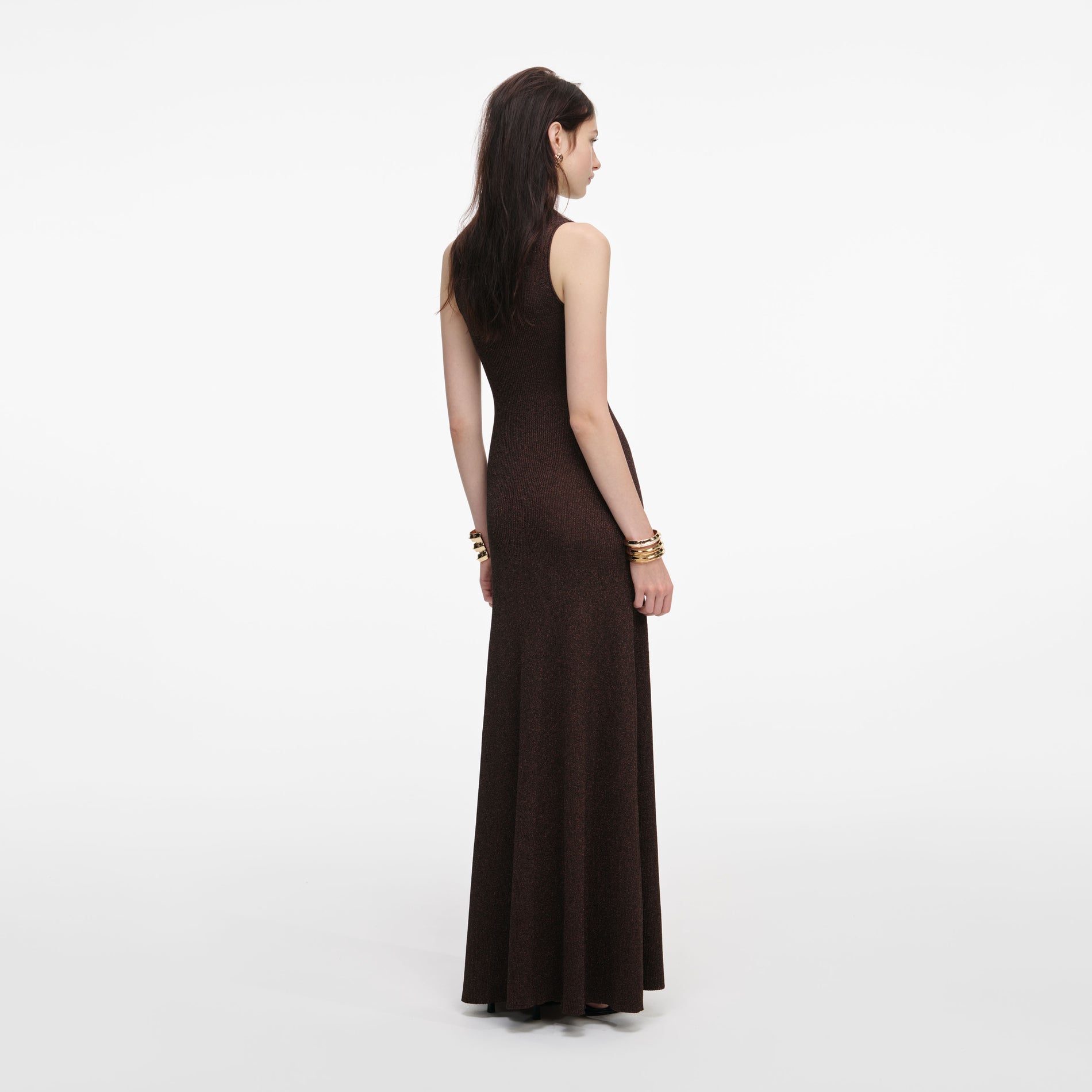 Back view of a woman wearing the Brown Lurex Knit Maxi Dress