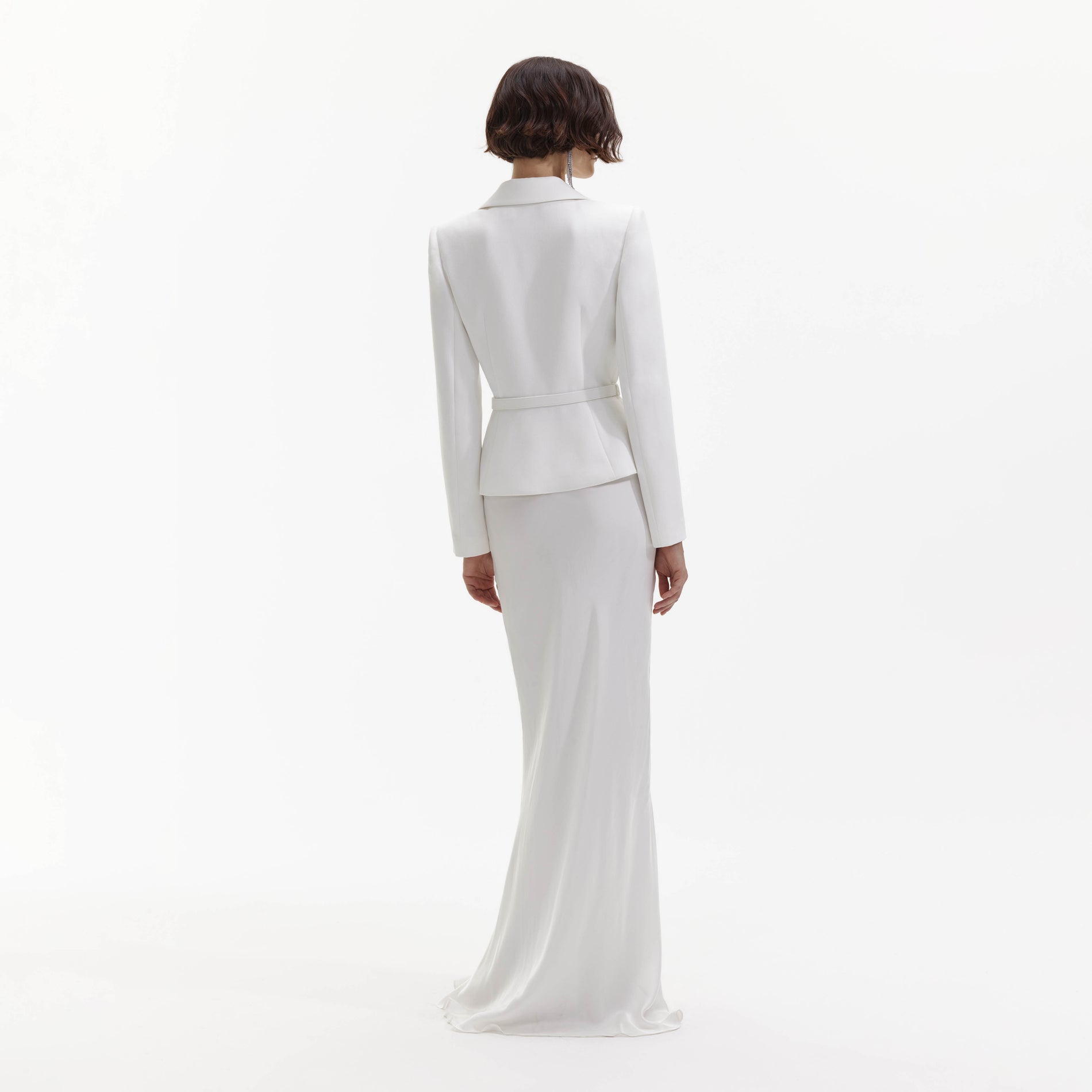 Back view of a woman wearing the White Crepe Tailored Maxi Dress