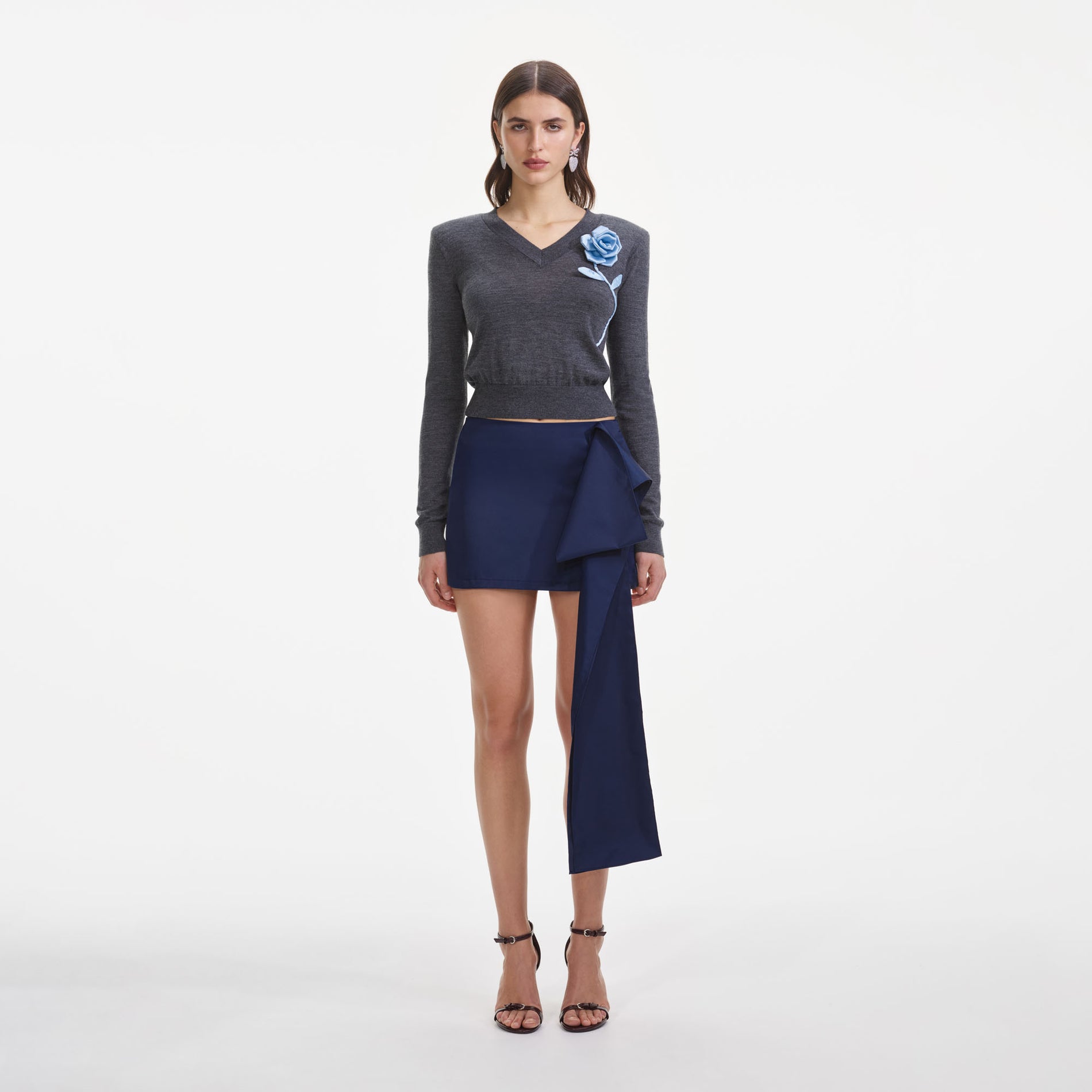 Front view of a woman wearing the Charcoal Blue Rose Lightweight Jumper