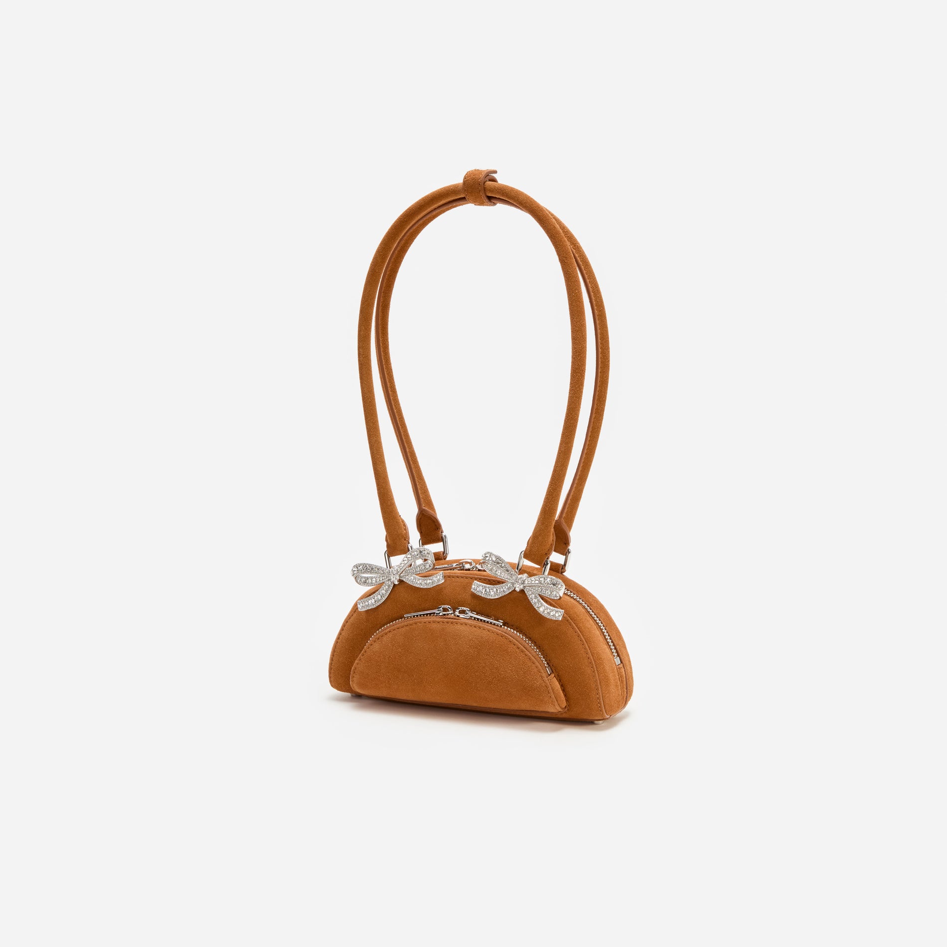 A photo of the Brown Suede Curved Mini Shoulder Bag