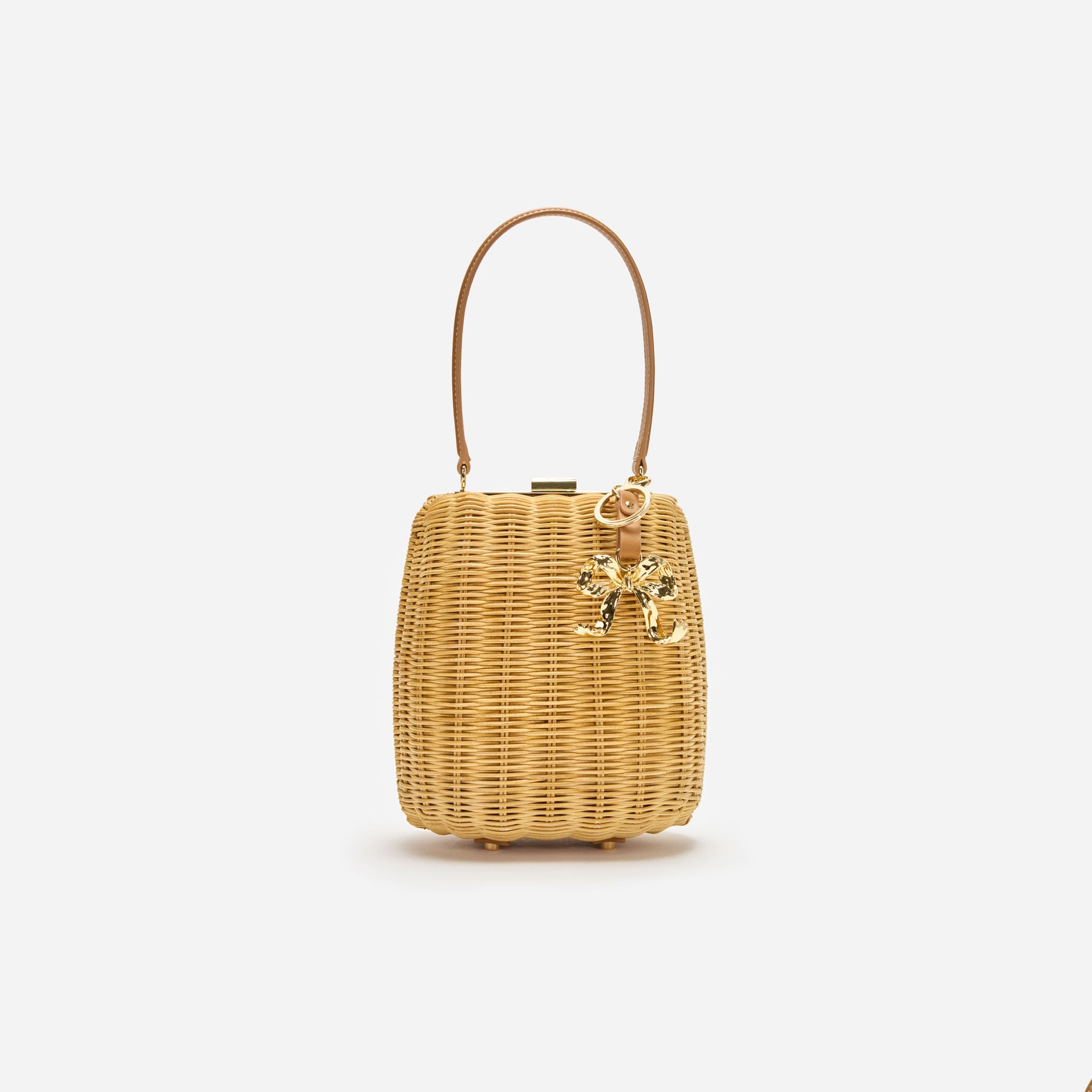A photo of the Brown Rattan Bag With Keychain