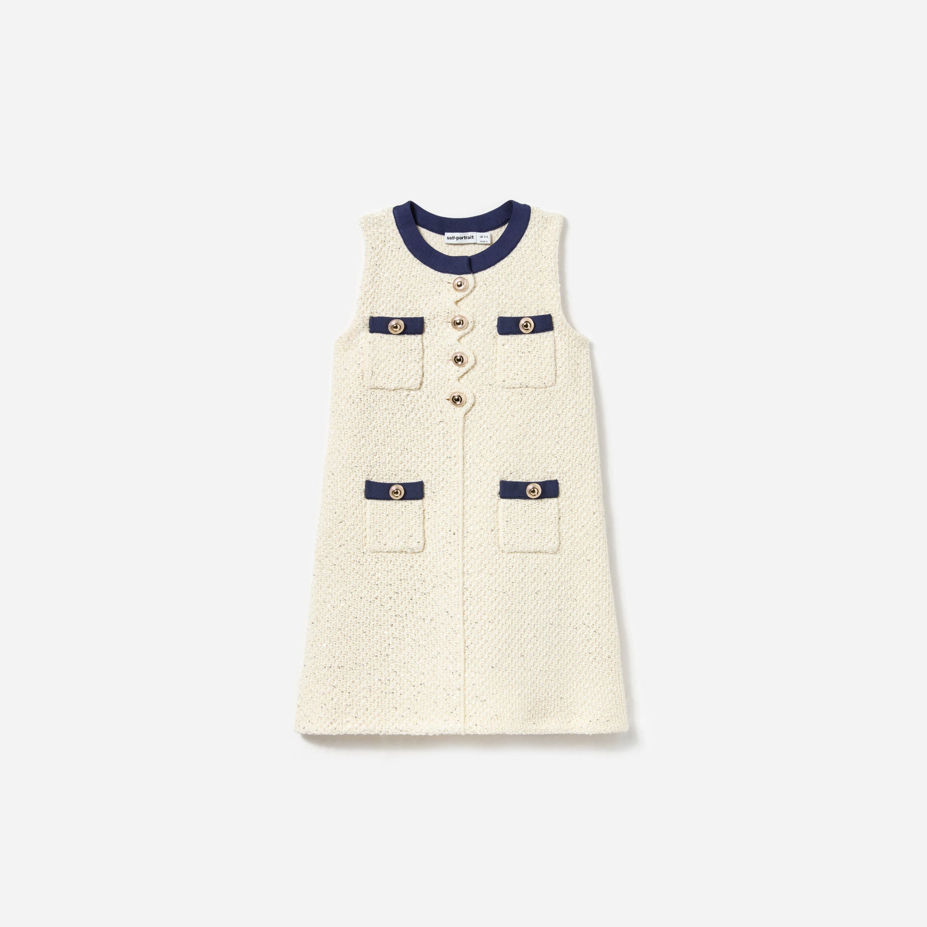 Front view of a woman wearing the Cream Sequin Knit Dress