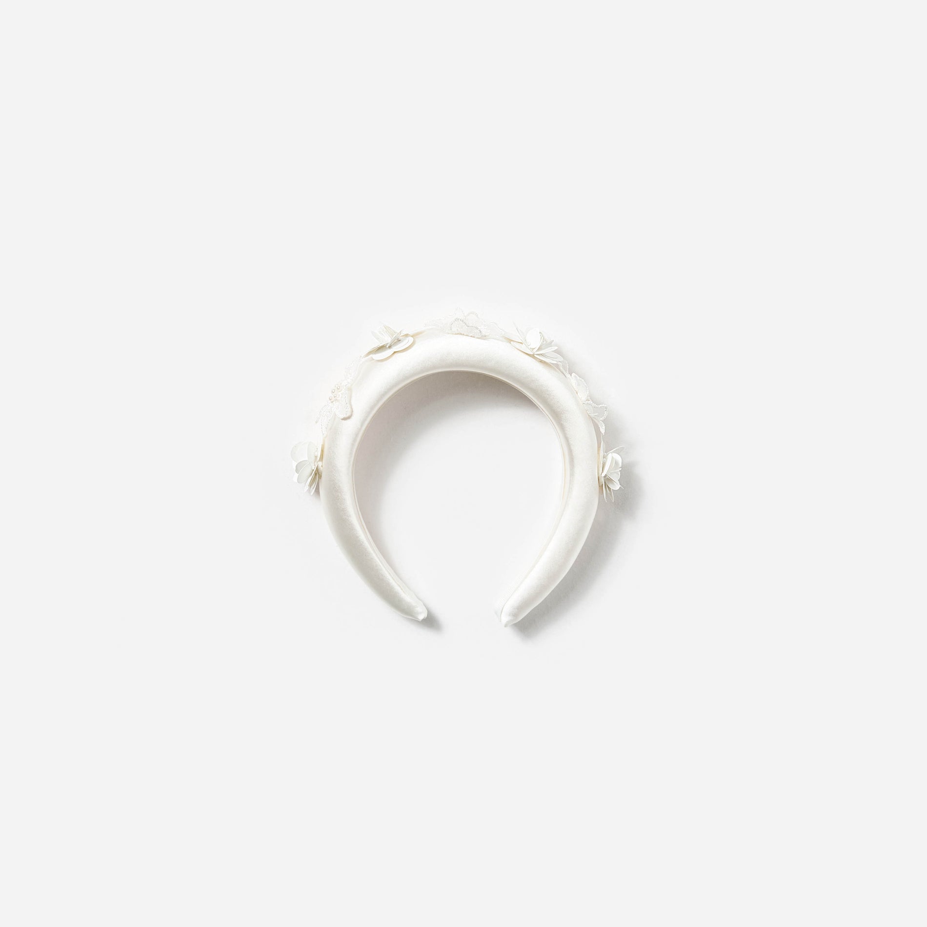 A photo of the Cream Satin Flower Headband