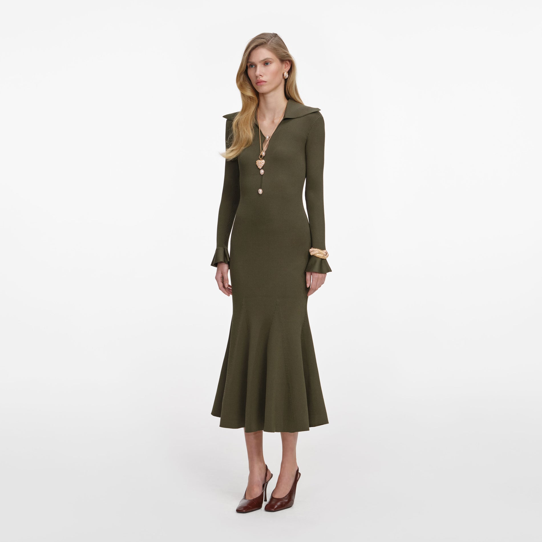 Side view of a woman wearing the Khaki Pointelle Knit Midi Dress