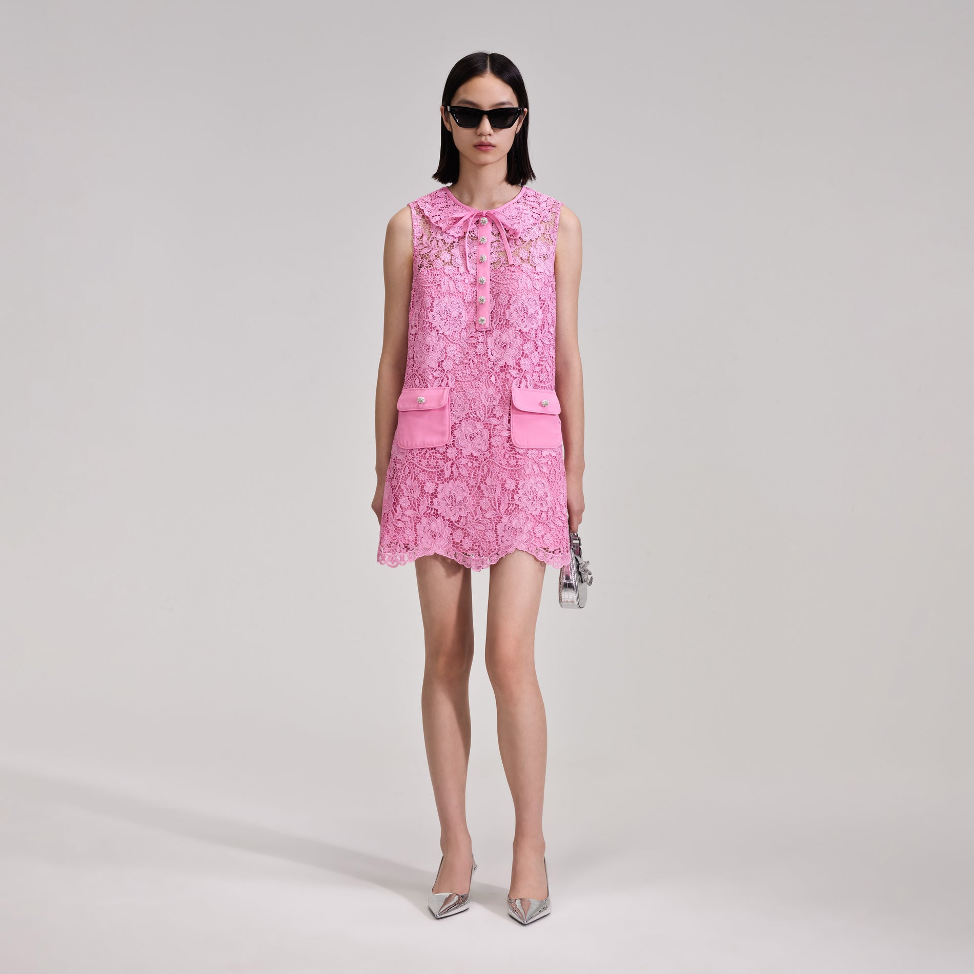 A woman wearing the Pink Cord Lace Collar Mini Dress